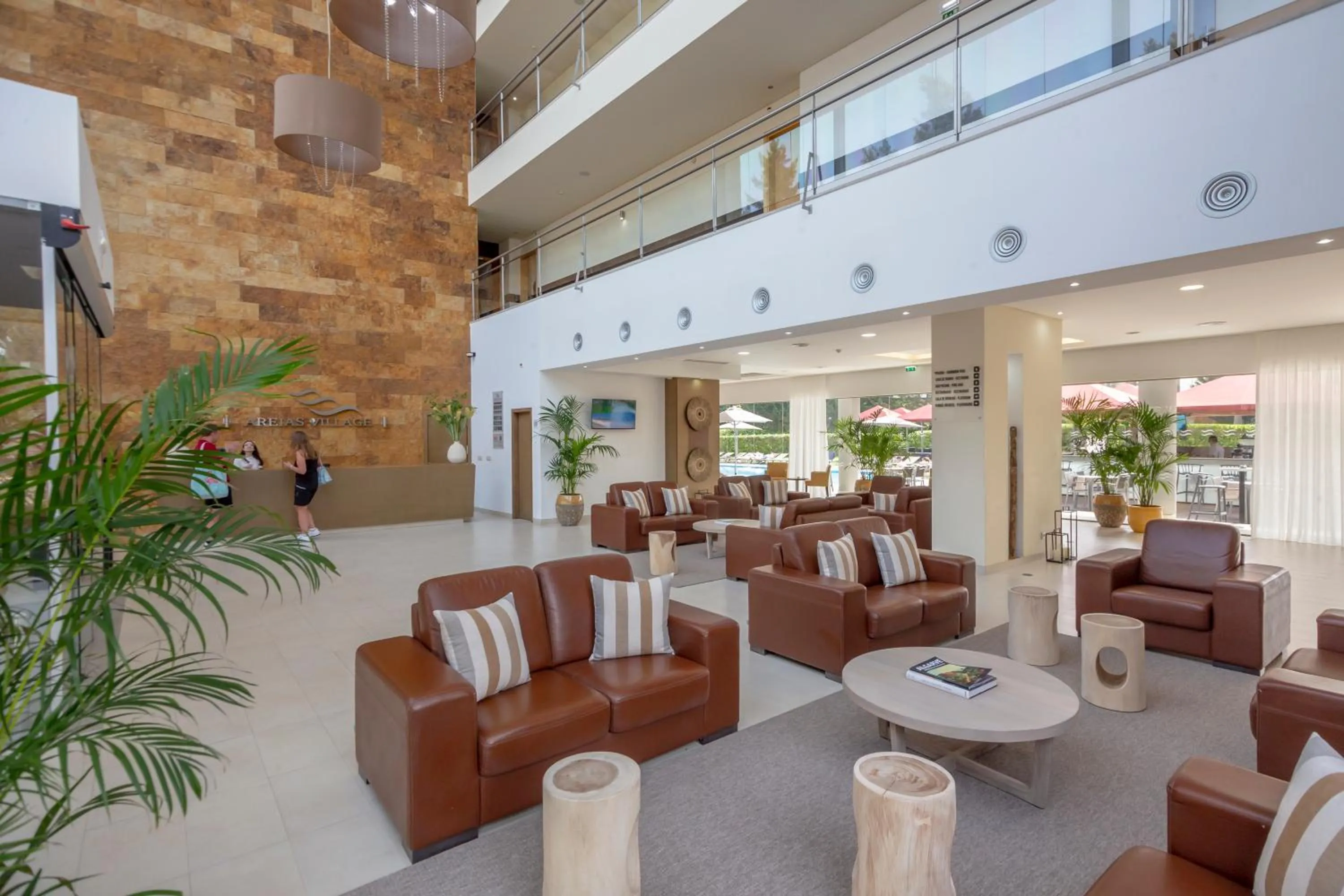 Lobby or reception in Areias Village Beach Suite Hotel