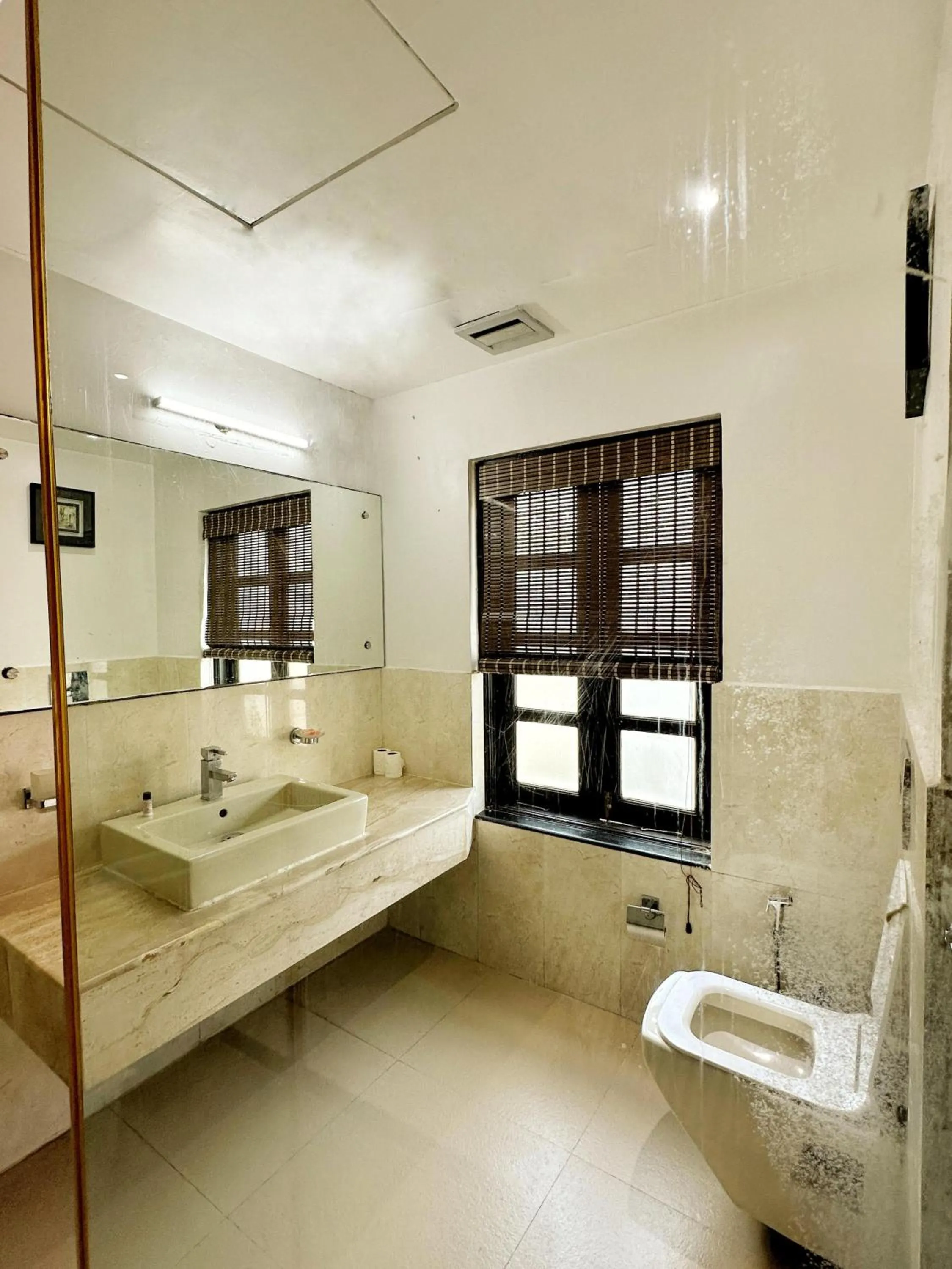 Toilet in Silver Sands Hideaway Resort, Candolim
