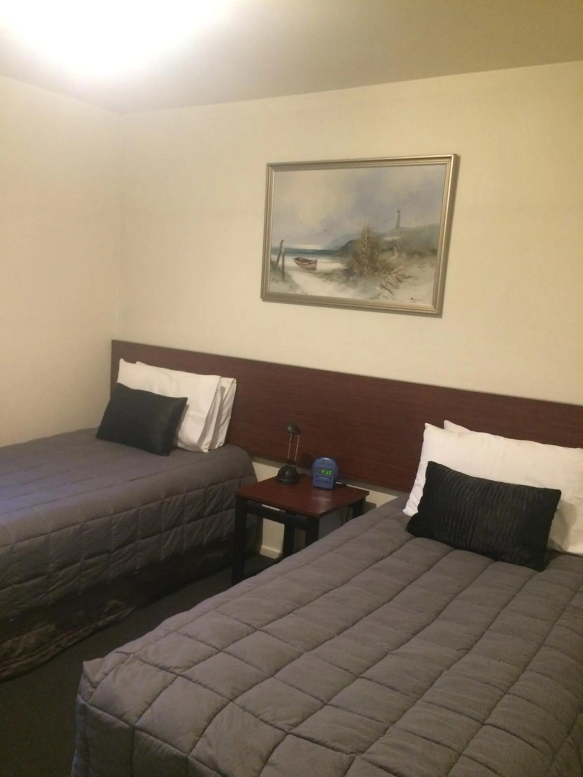 Bed in Sherborne Motor Lodge