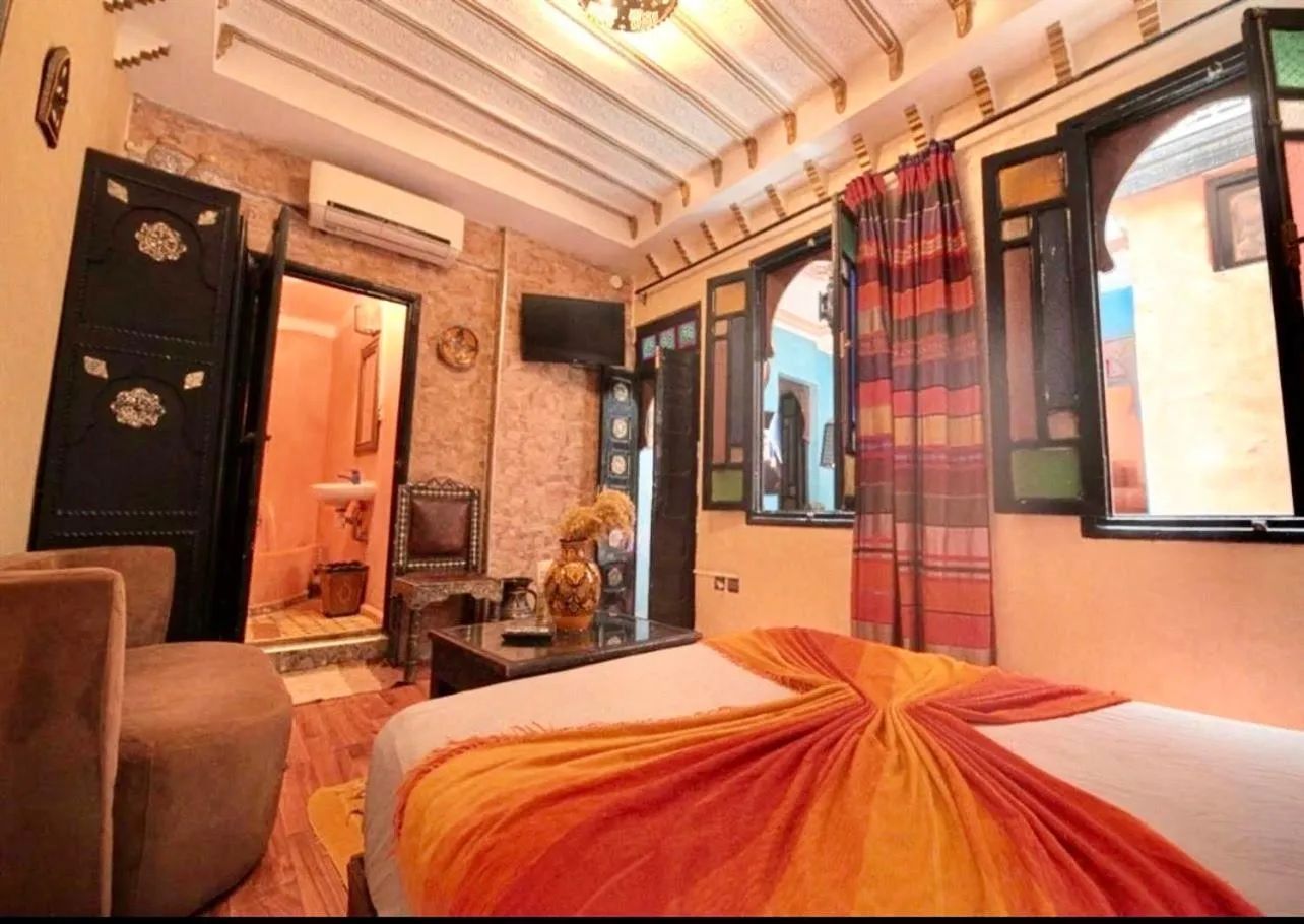 Bed in Riad Maison Aicha