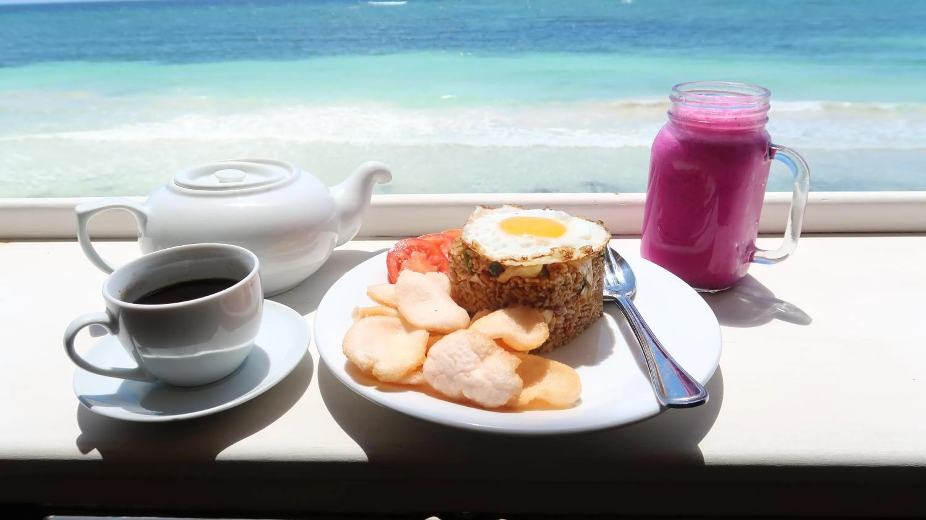 Breakfast in Phinisi Hostel Bira