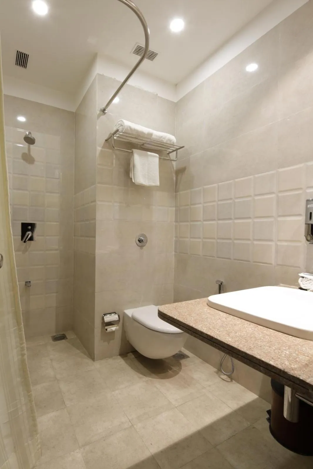 Toilet in Regenta Inn Ranip Ahmedabad