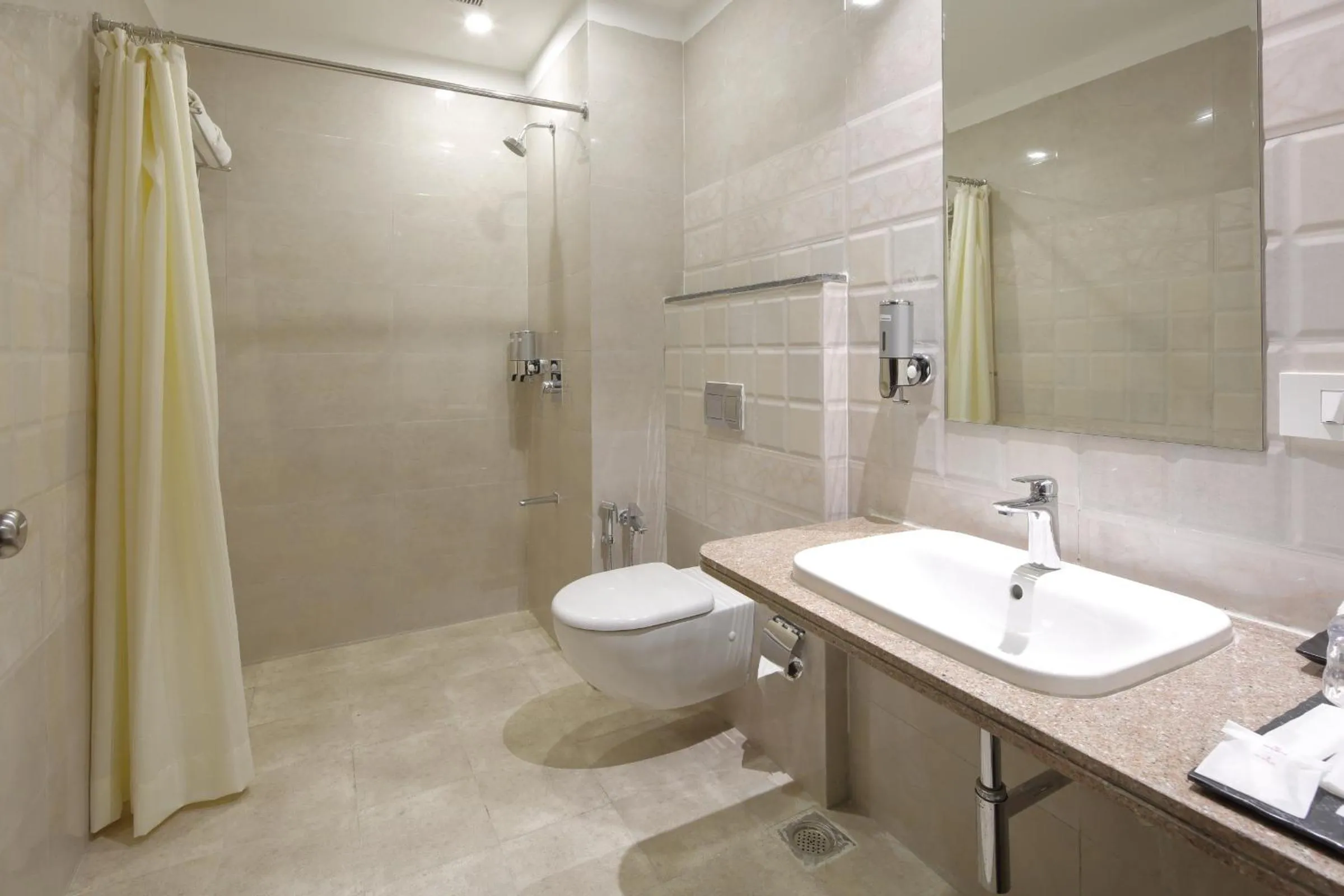 Bathroom in Regenta Inn Ranip Ahmedabad