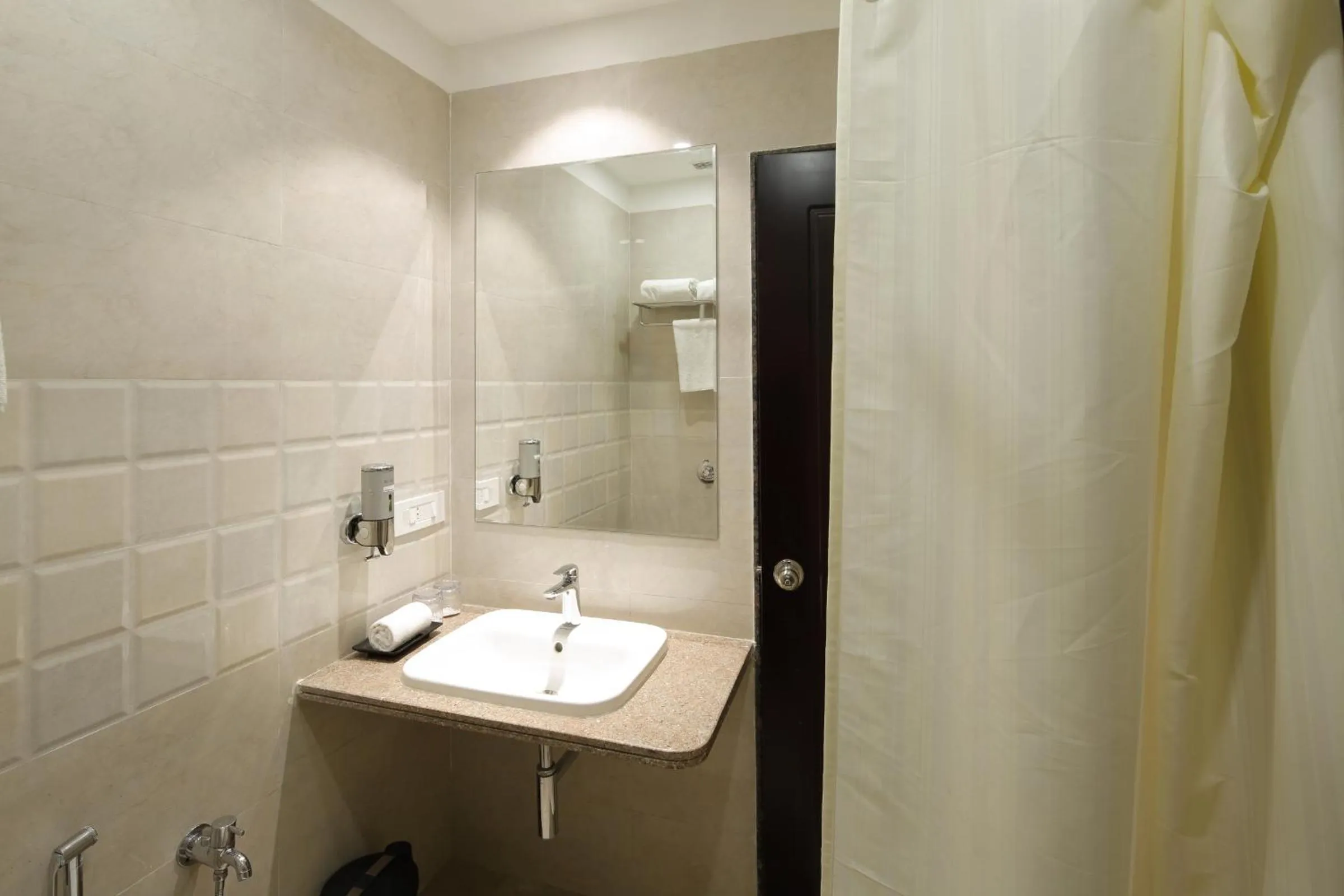 Bathroom in Regenta Inn Ranip Ahmedabad
