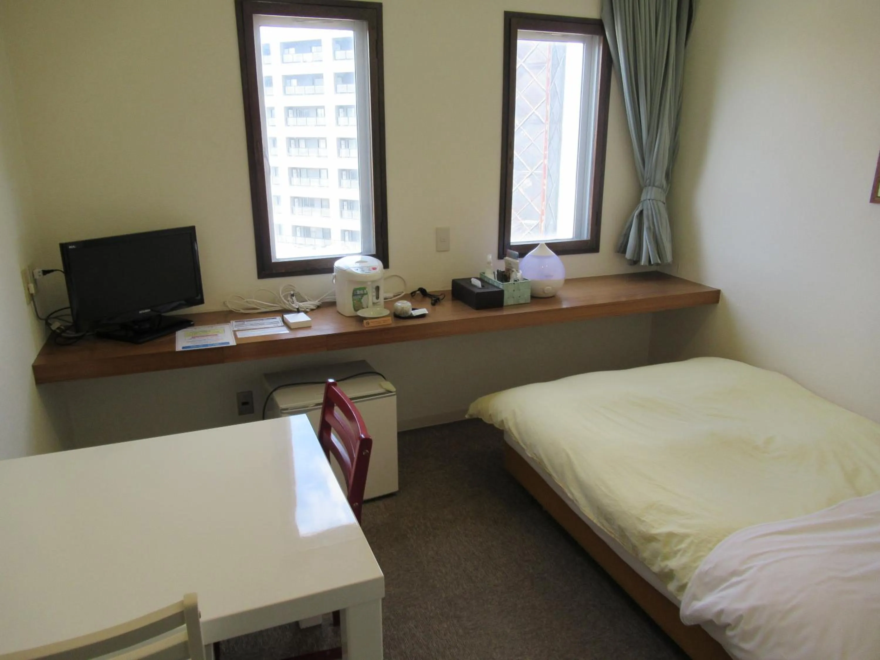 Photo of the whole room, Bed in Hotel Crown Hills Kitami Annex