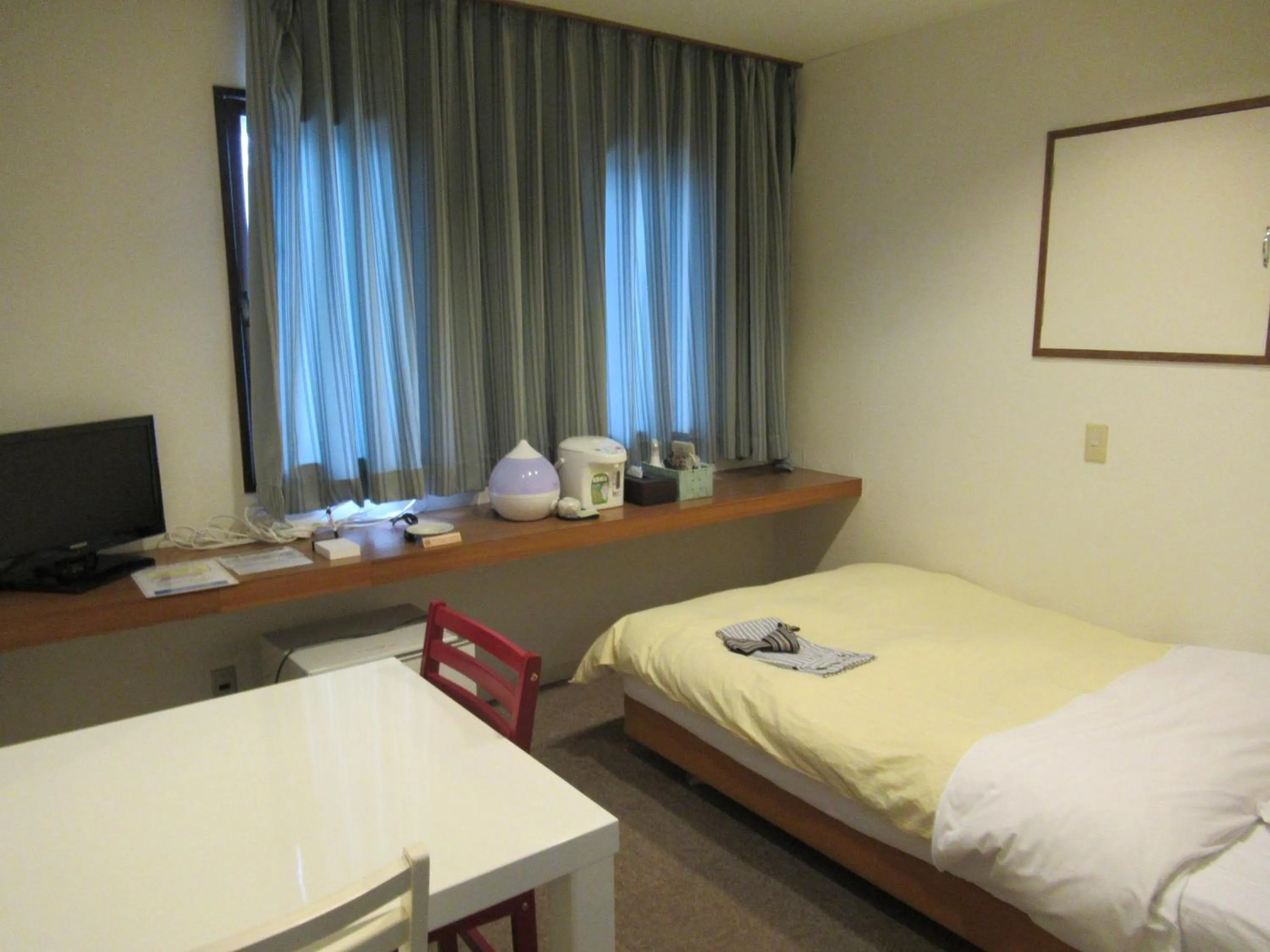 Photo of the whole room, Bed in Hotel Crown Hills Kitami Annex