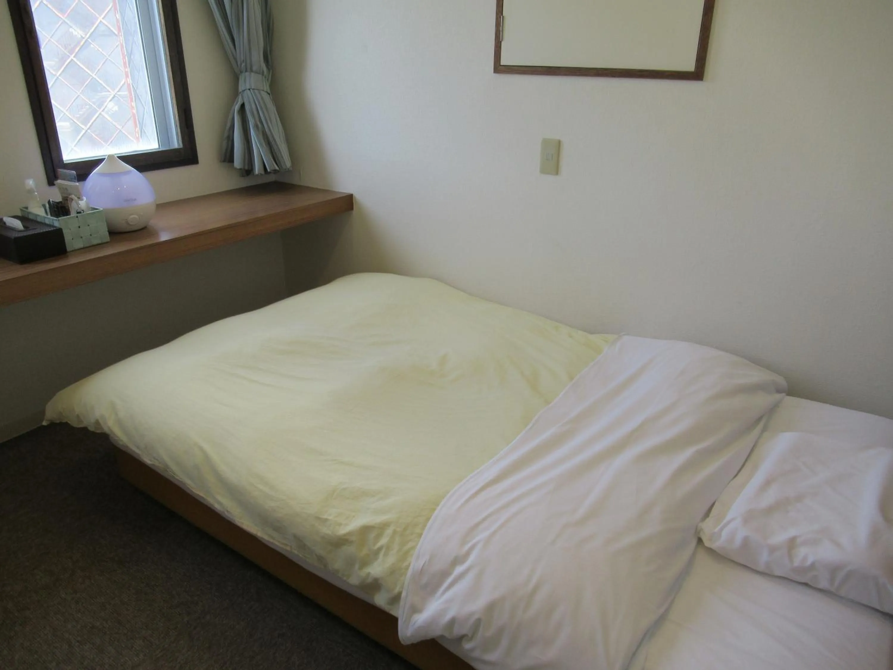 Photo of the whole room, Bed in Hotel Crown Hills Kitami Annex
