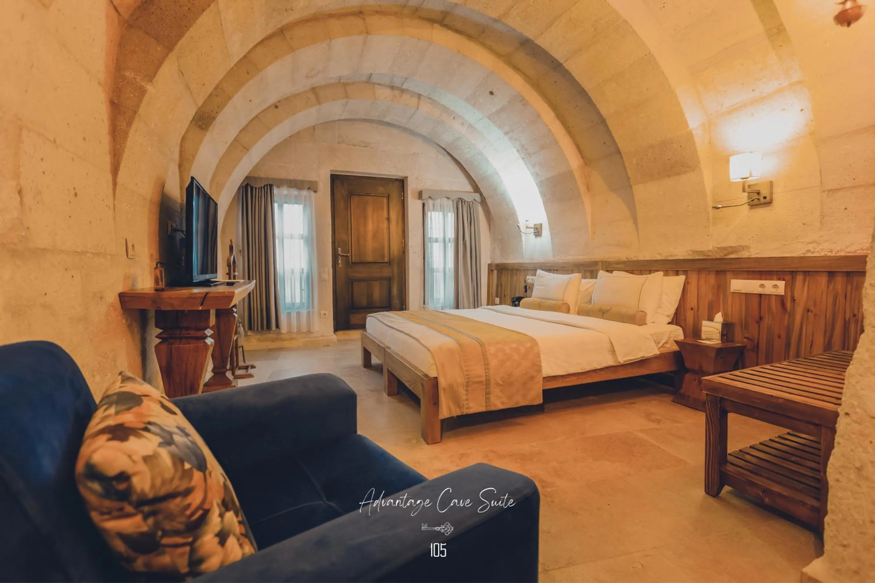 Bed in Nino Cave Suites