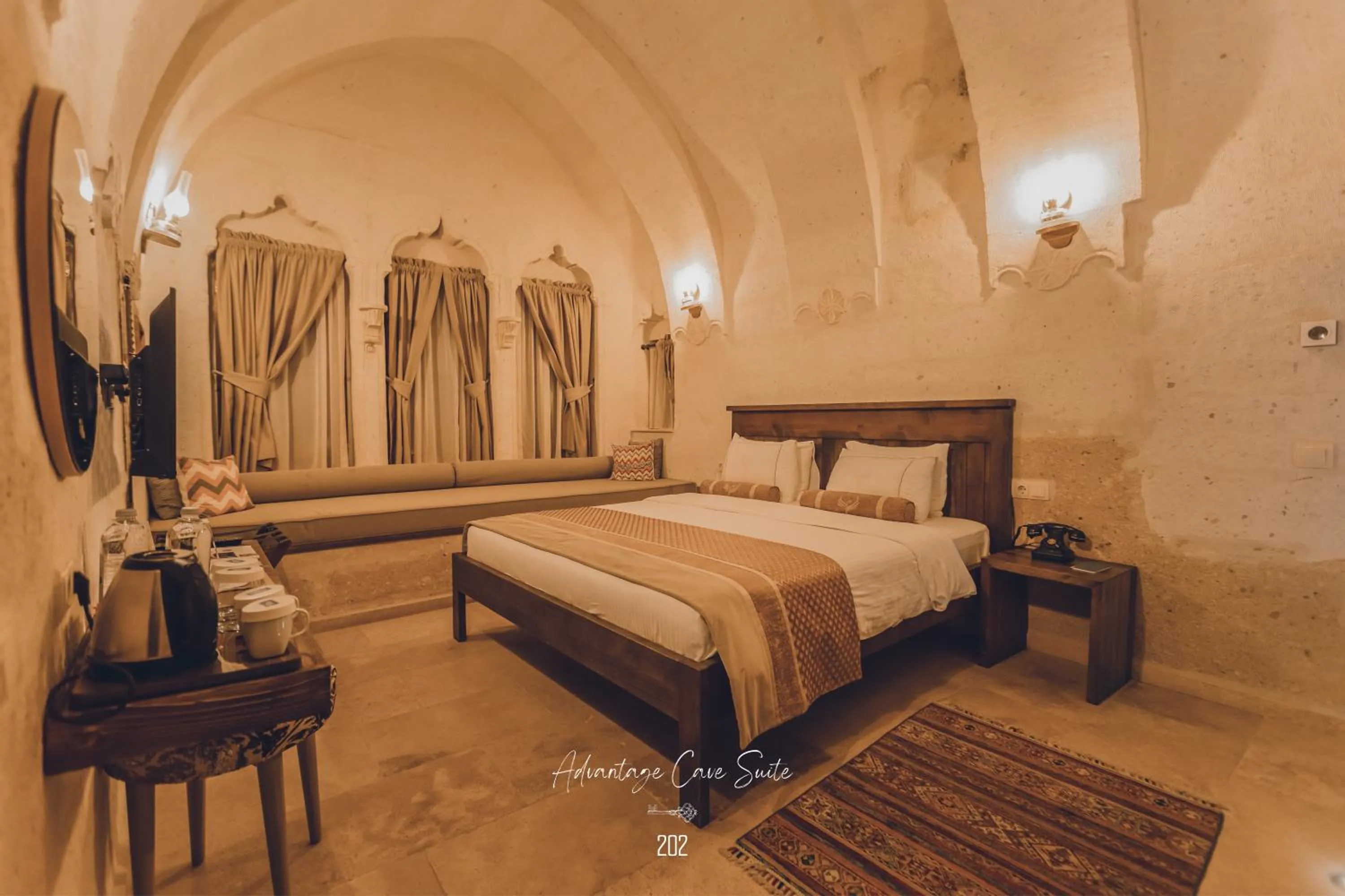 Bed in Nino Cave Suites