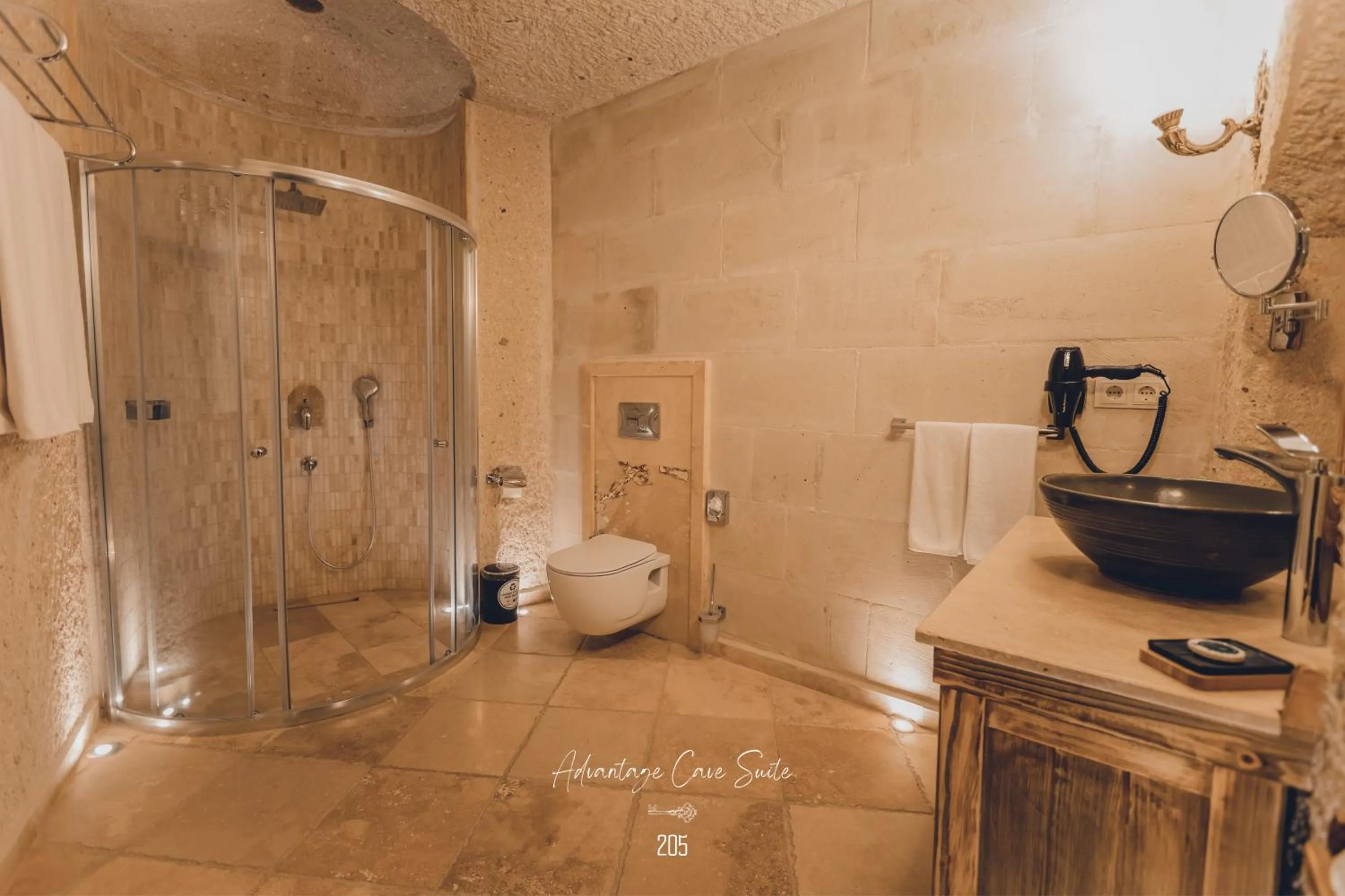 Shower in Nino Cave Suites