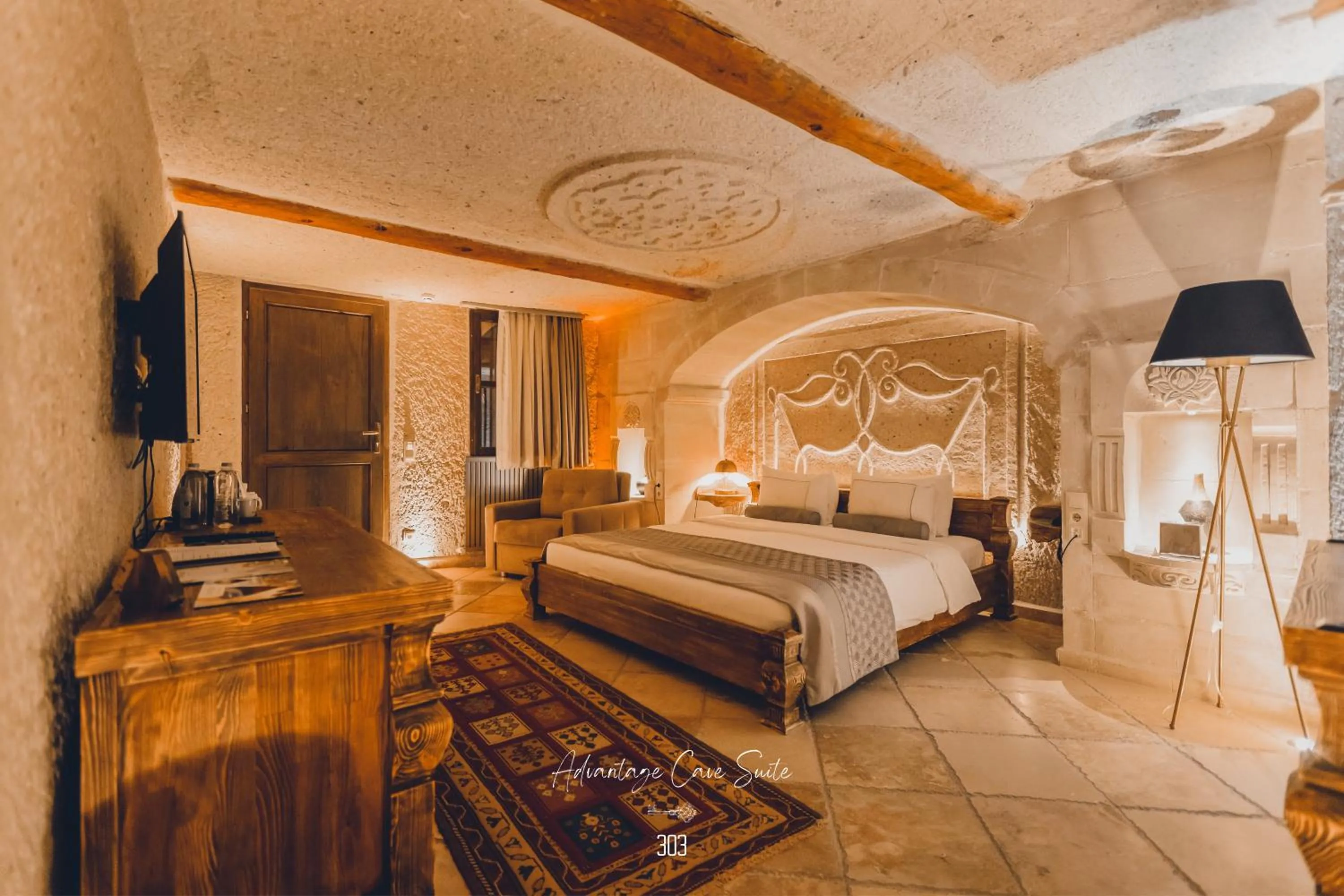 Bed in Nino Cave Suites