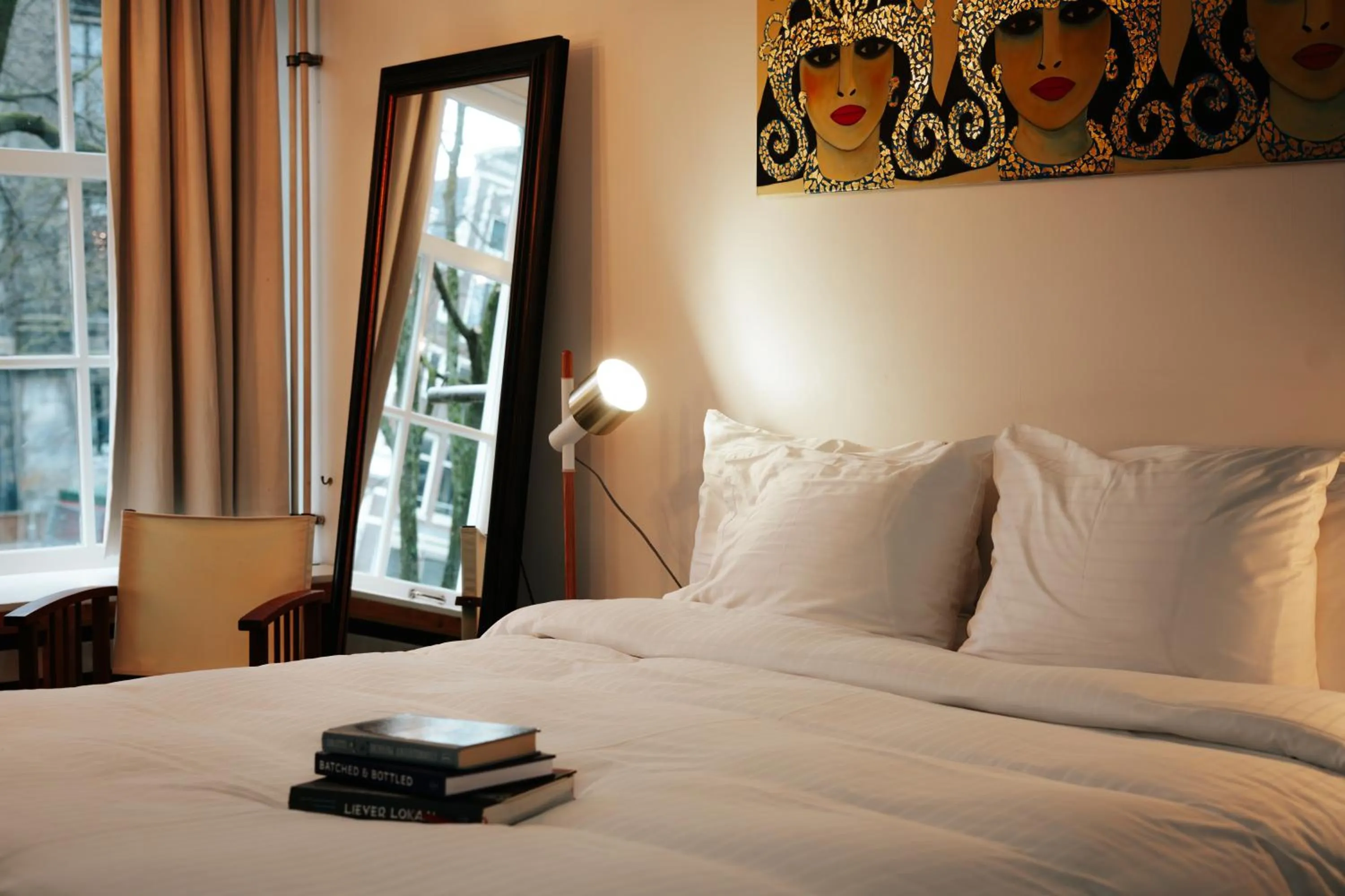 Bed in Rosalia's Menagerie Cocktail bar & InnUpstairs