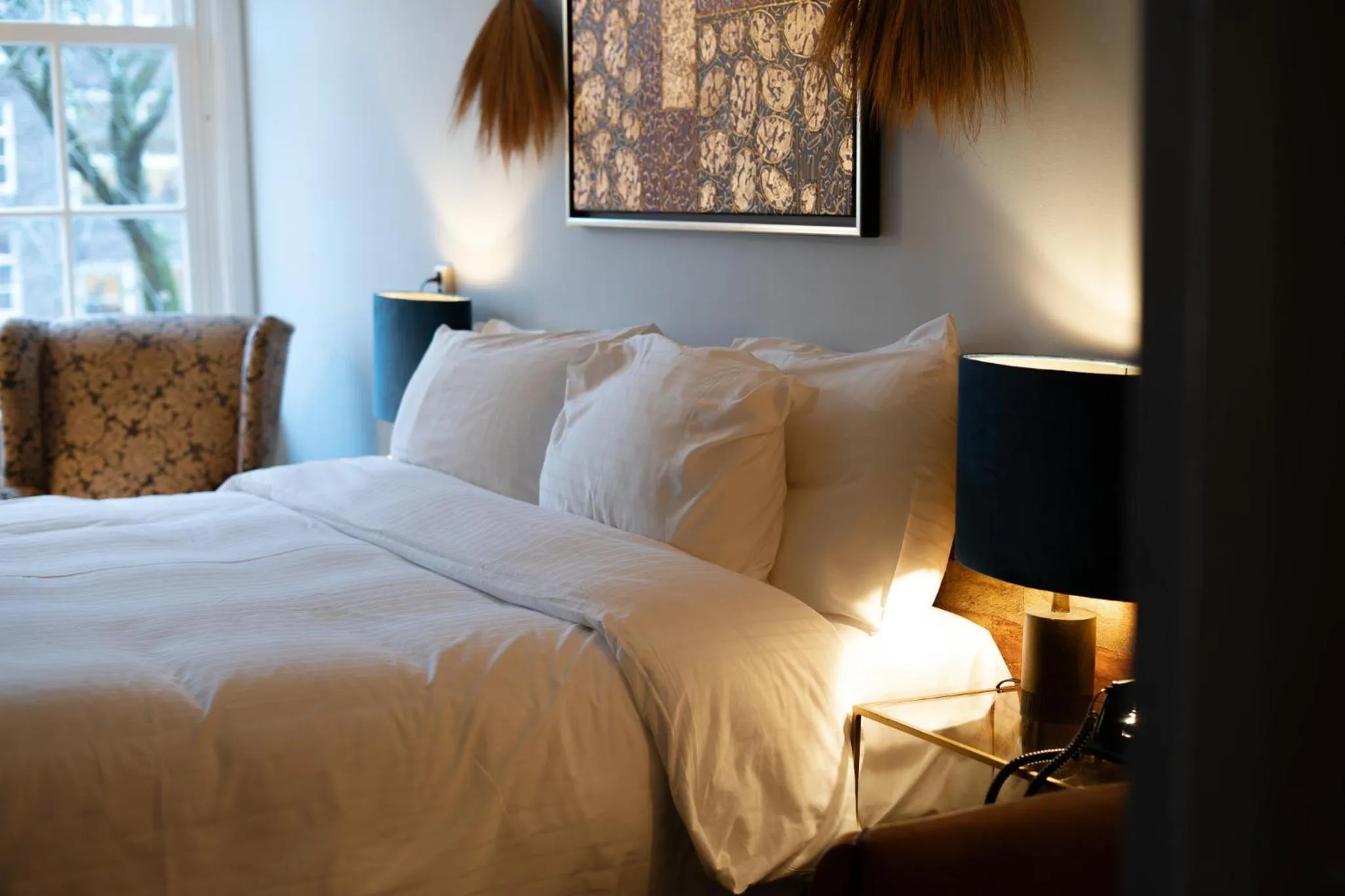 Bed in Rosalia's Menagerie Cocktail bar & InnUpstairs