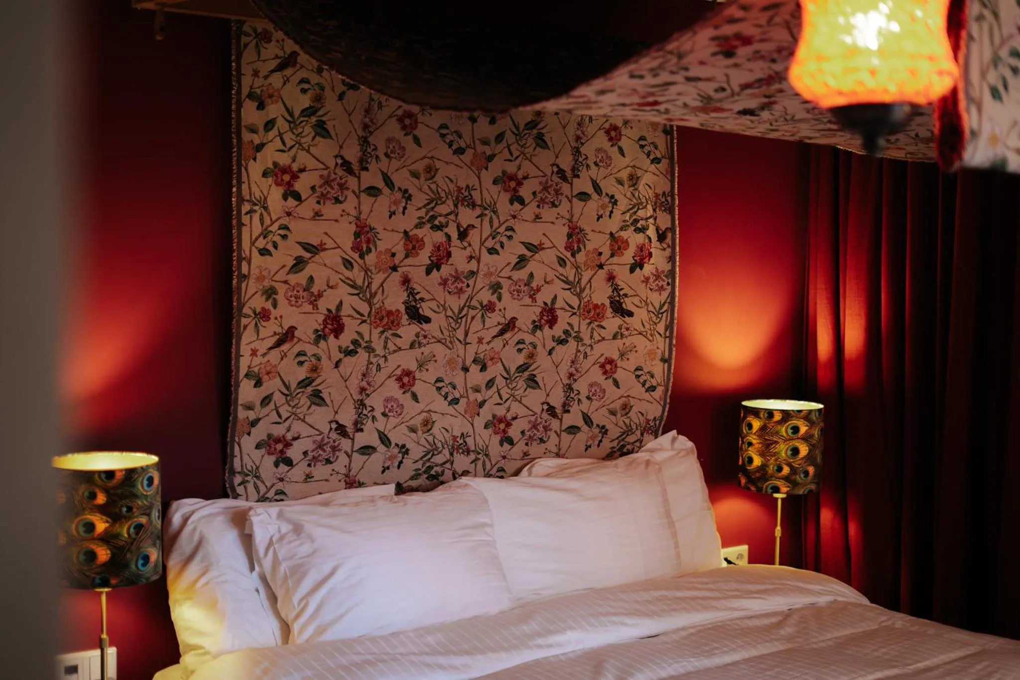 Bed in Rosalia's Menagerie Cocktail bar & InnUpstairs