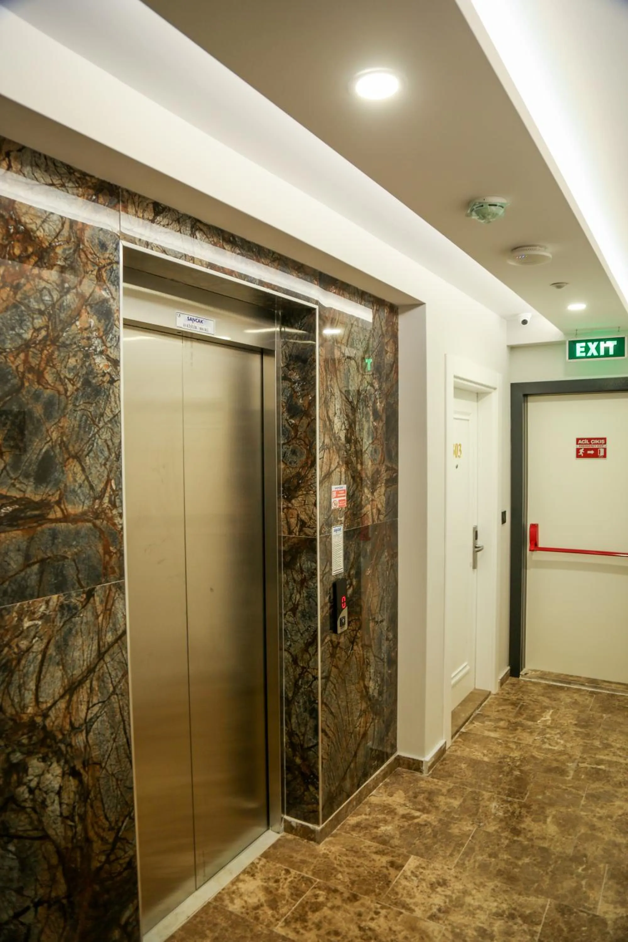 elevator in White Golden Suite Hotel