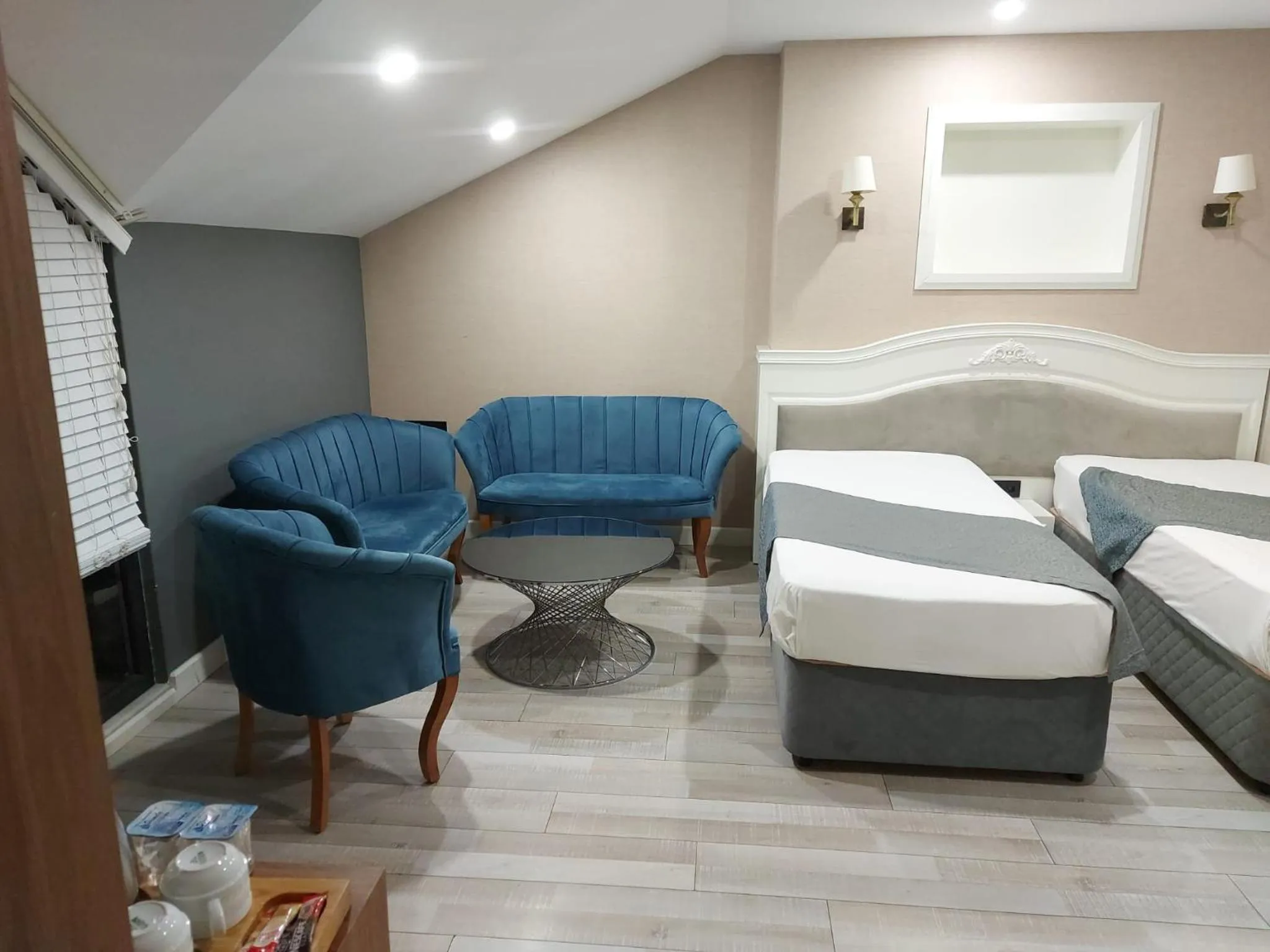 Seating area in White Golden Suite Hotel