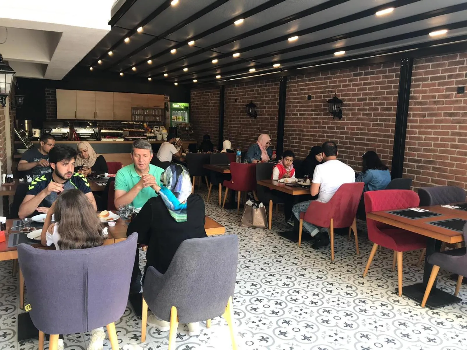 People in White Golden Suite Hotel