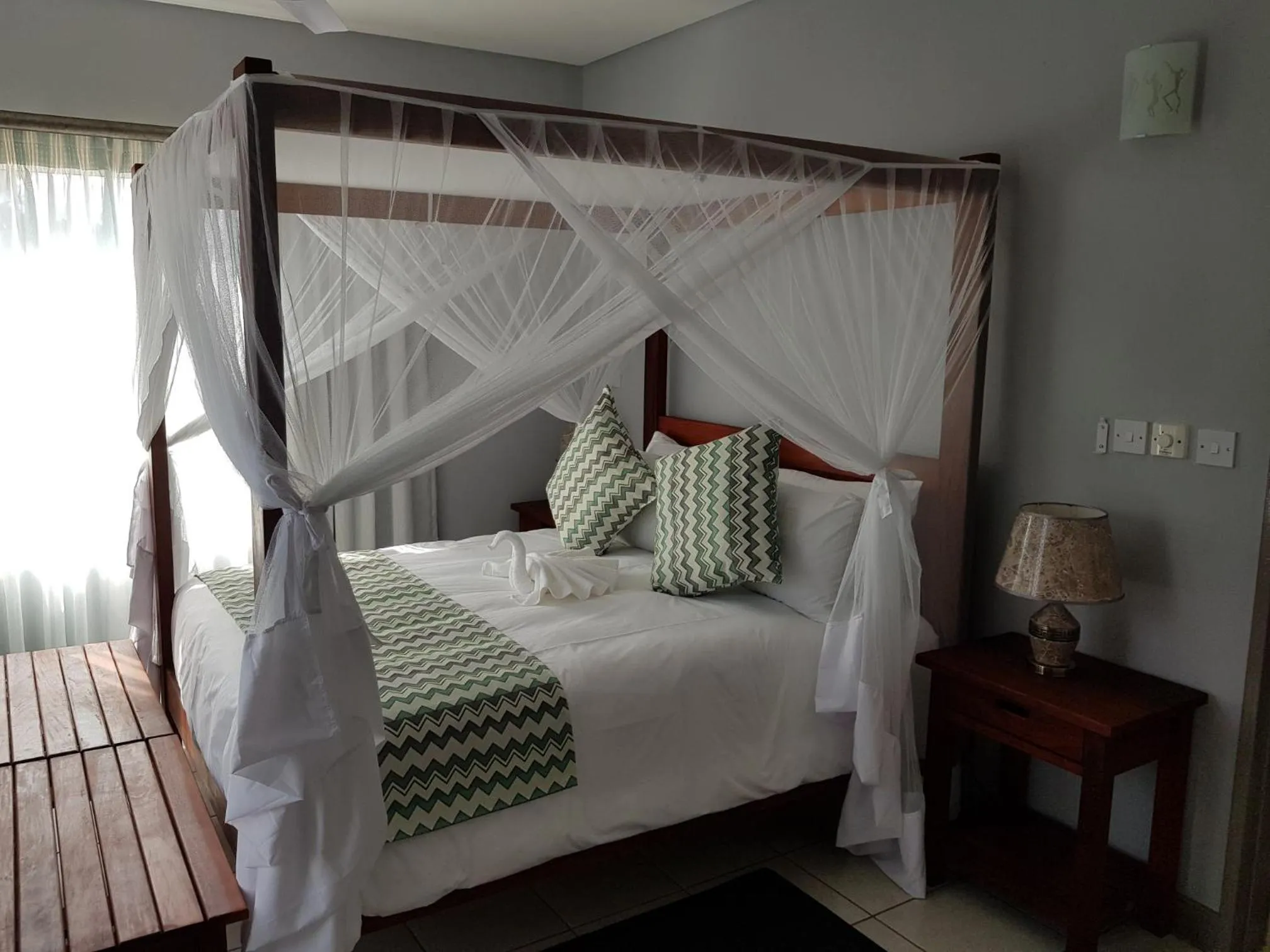 Bed in Tlou Safari Lodge