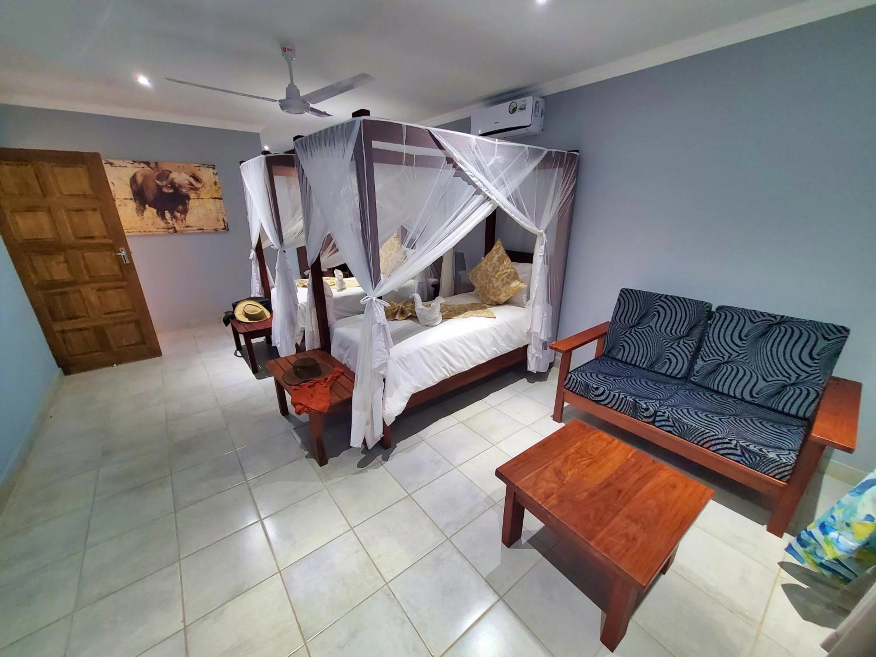 Bed in Tlou Safari Lodge