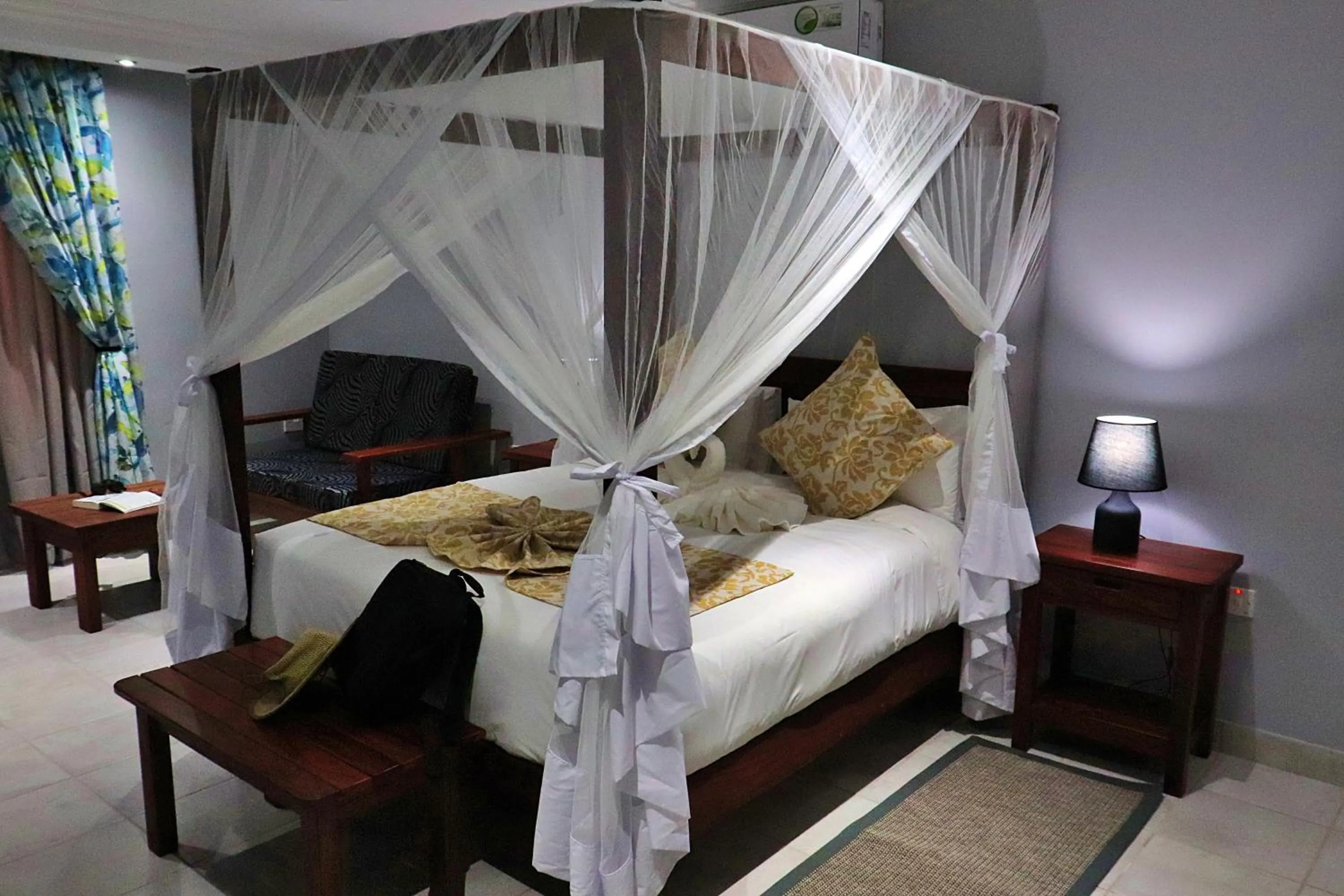 Bed in Tlou Safari Lodge
