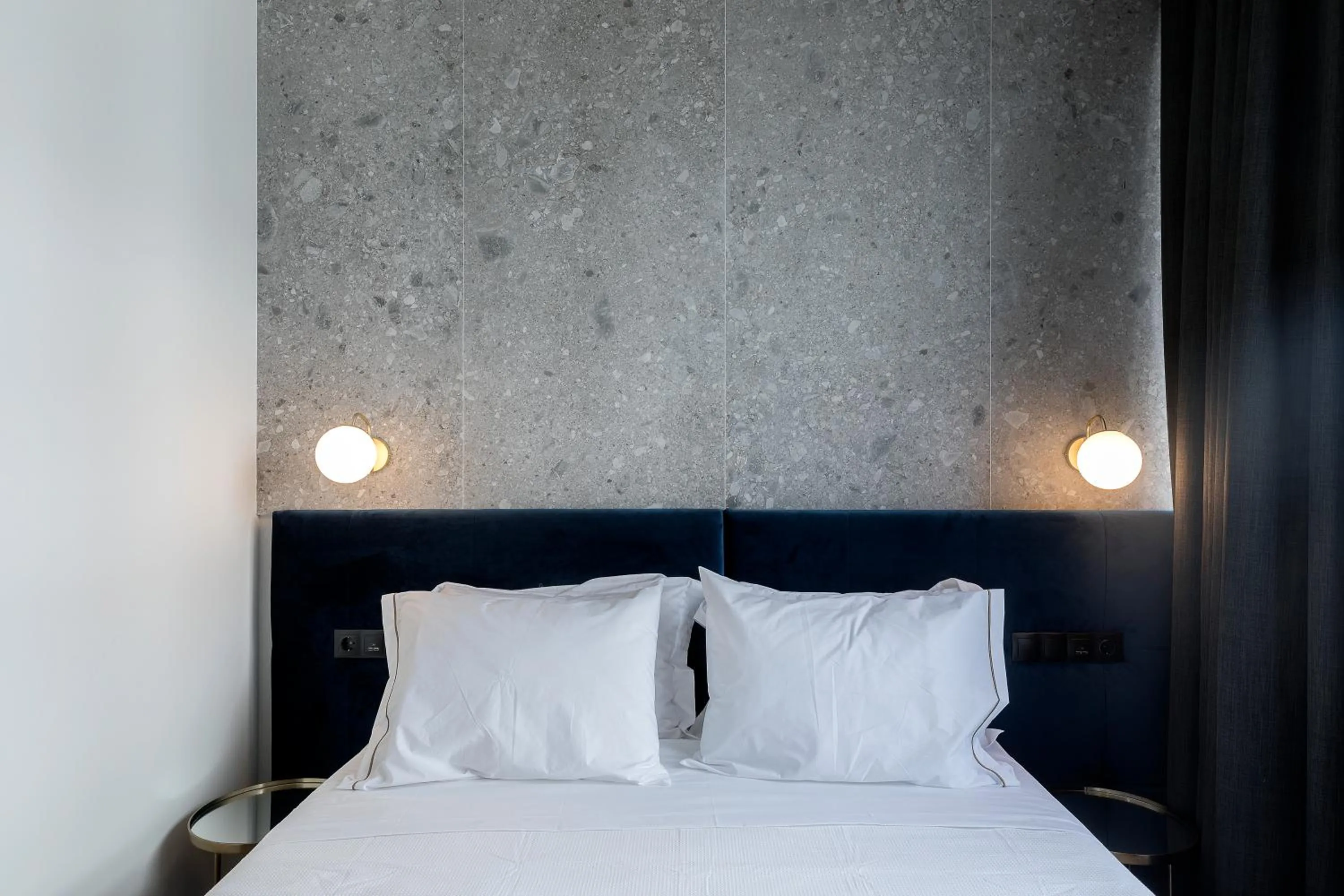 Bed in Philosofia Athens Suites