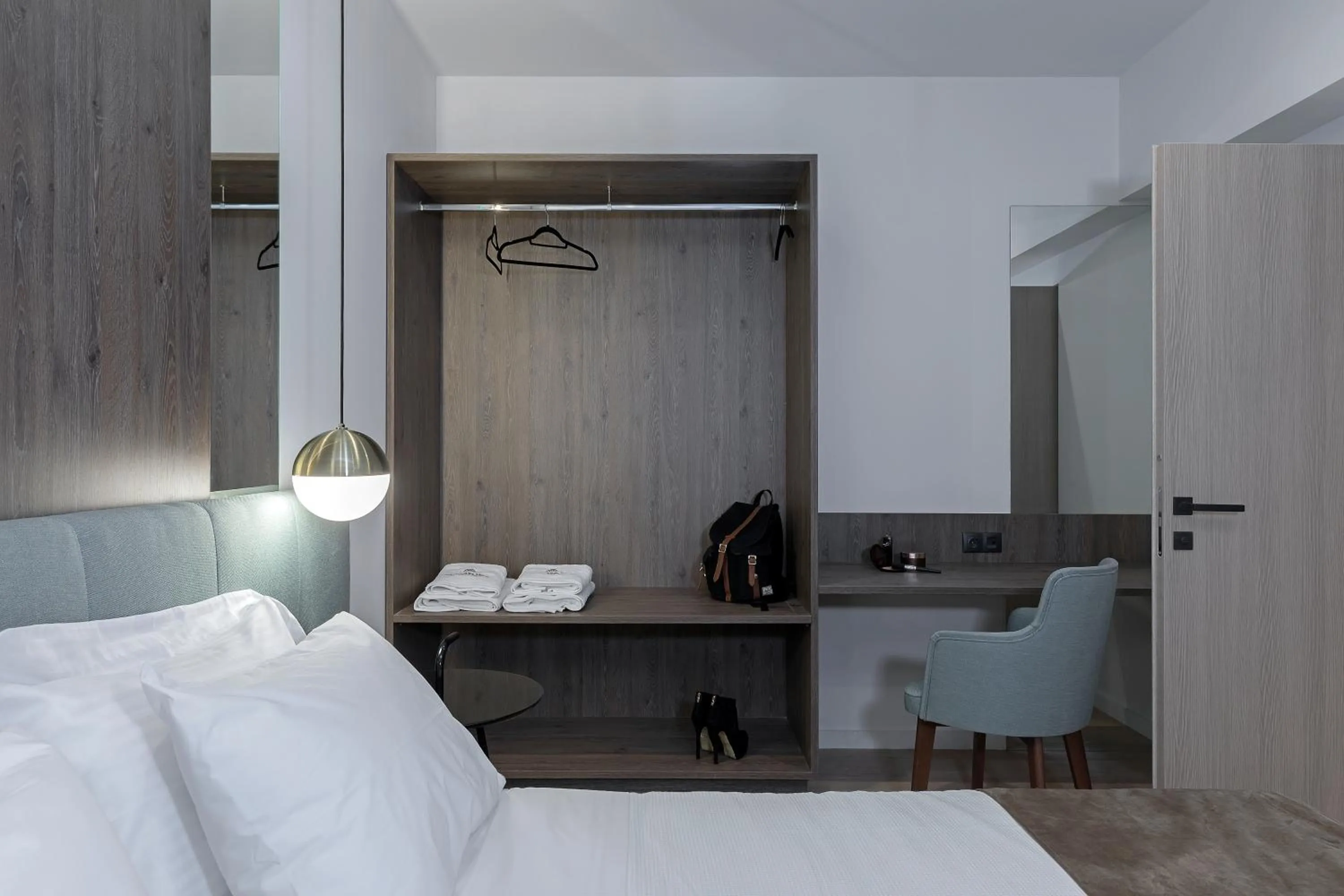 Bed in Philosofia Athens Suites