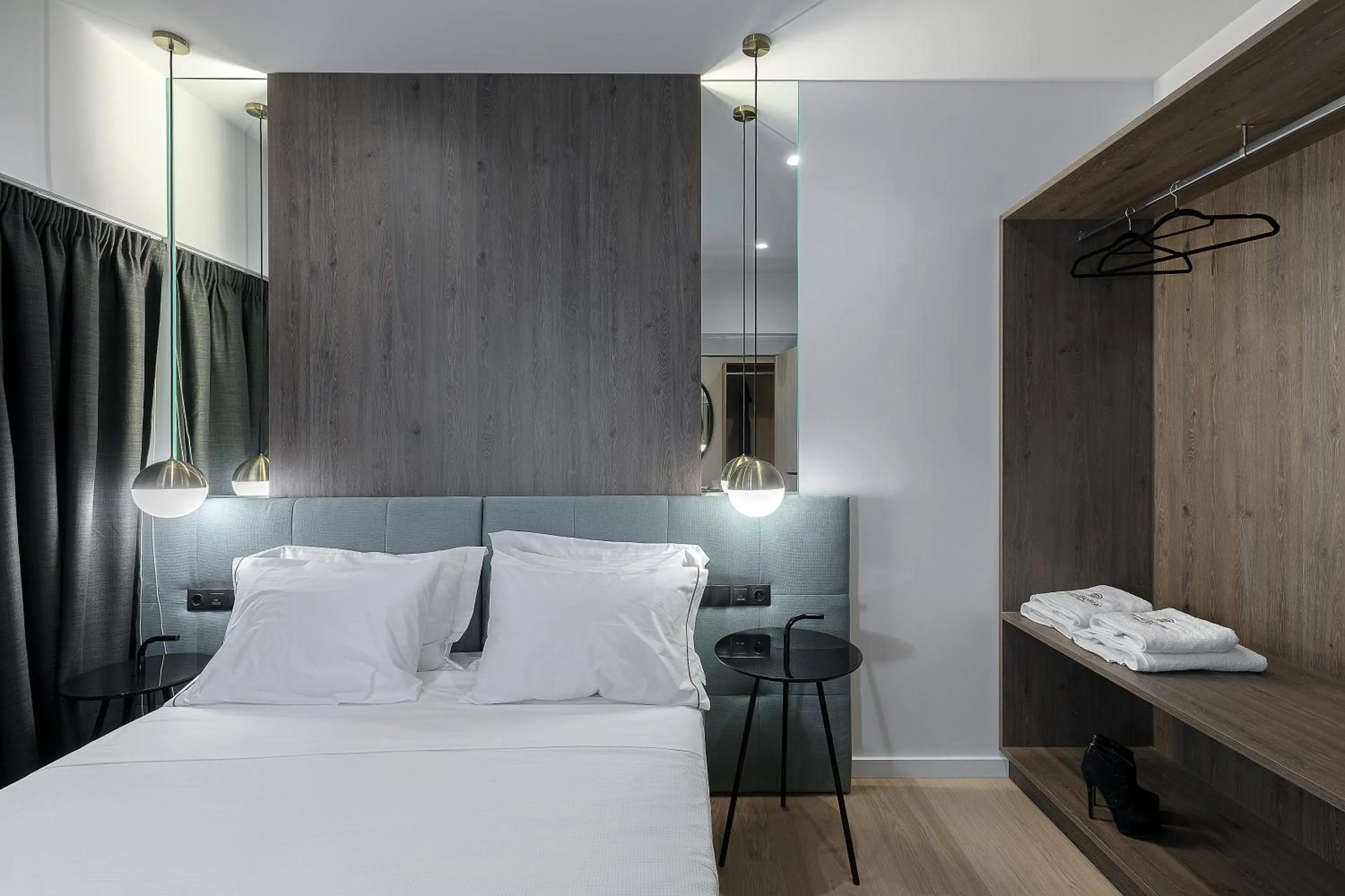 Bed in Philosofia Athens Suites