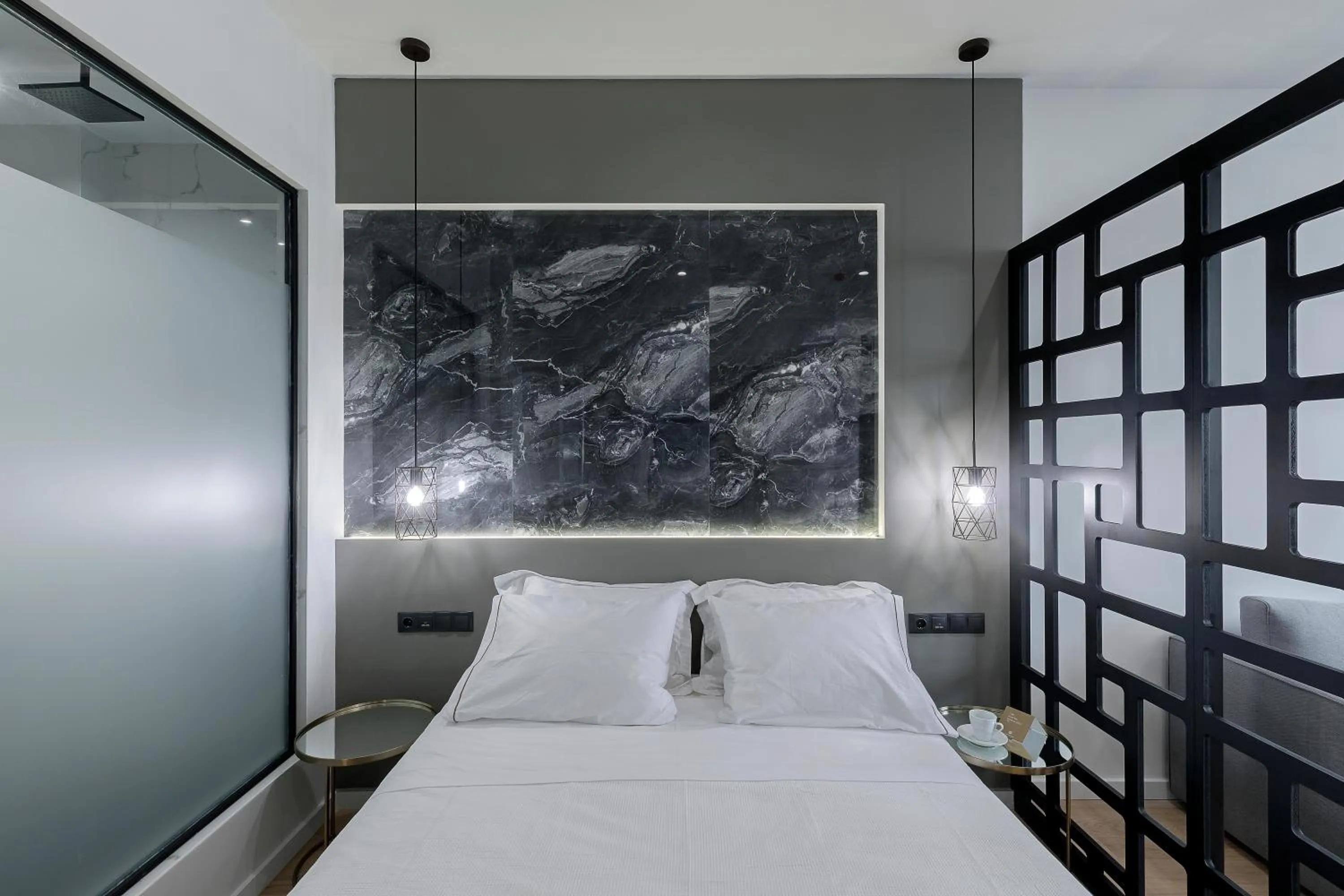 Bed in Philosofia Athens Suites