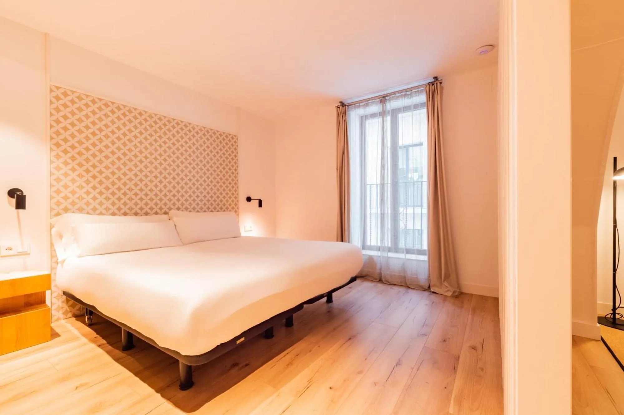 Bed in Port Plaza Apartments