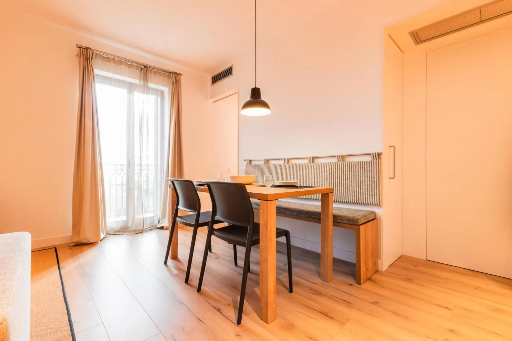 Dining area in Port Plaza Apartments