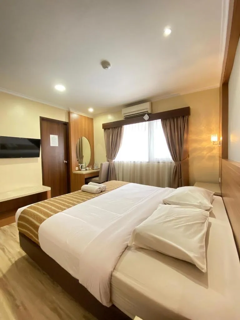 Bed in Cipta Hotel Wahid Hasyim