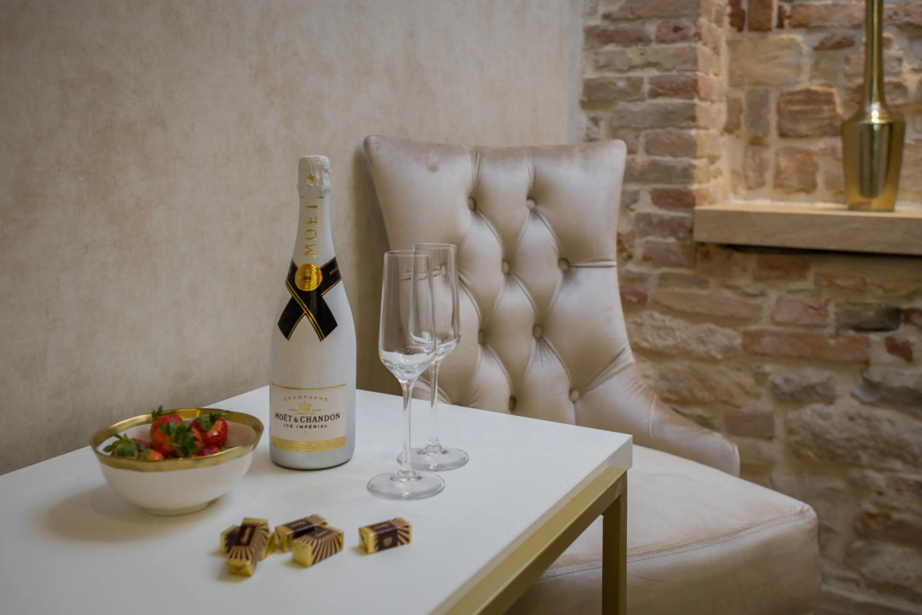 Seating area in Le Premier Luxury Rooms