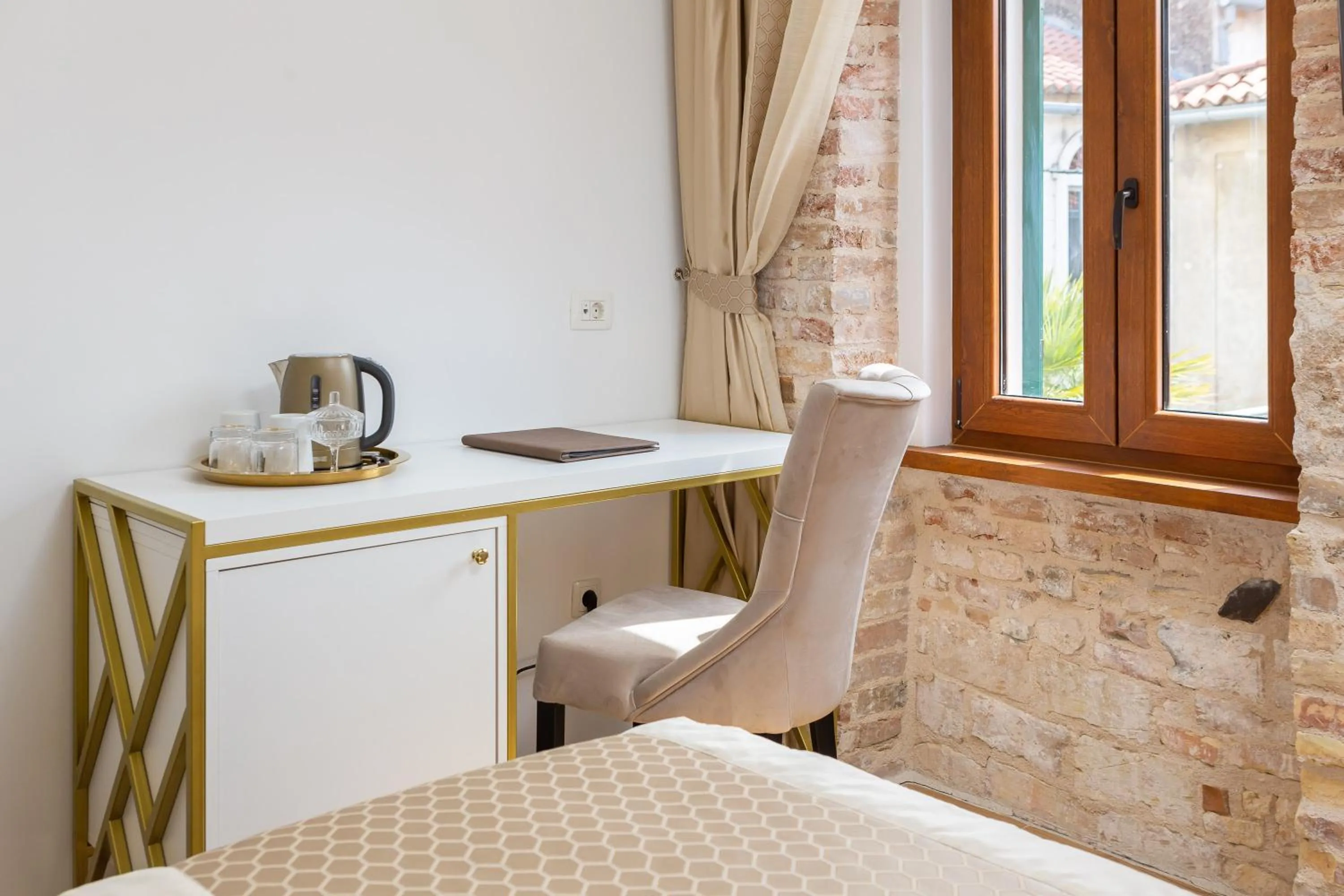 Seating area in Le Premier Luxury Rooms