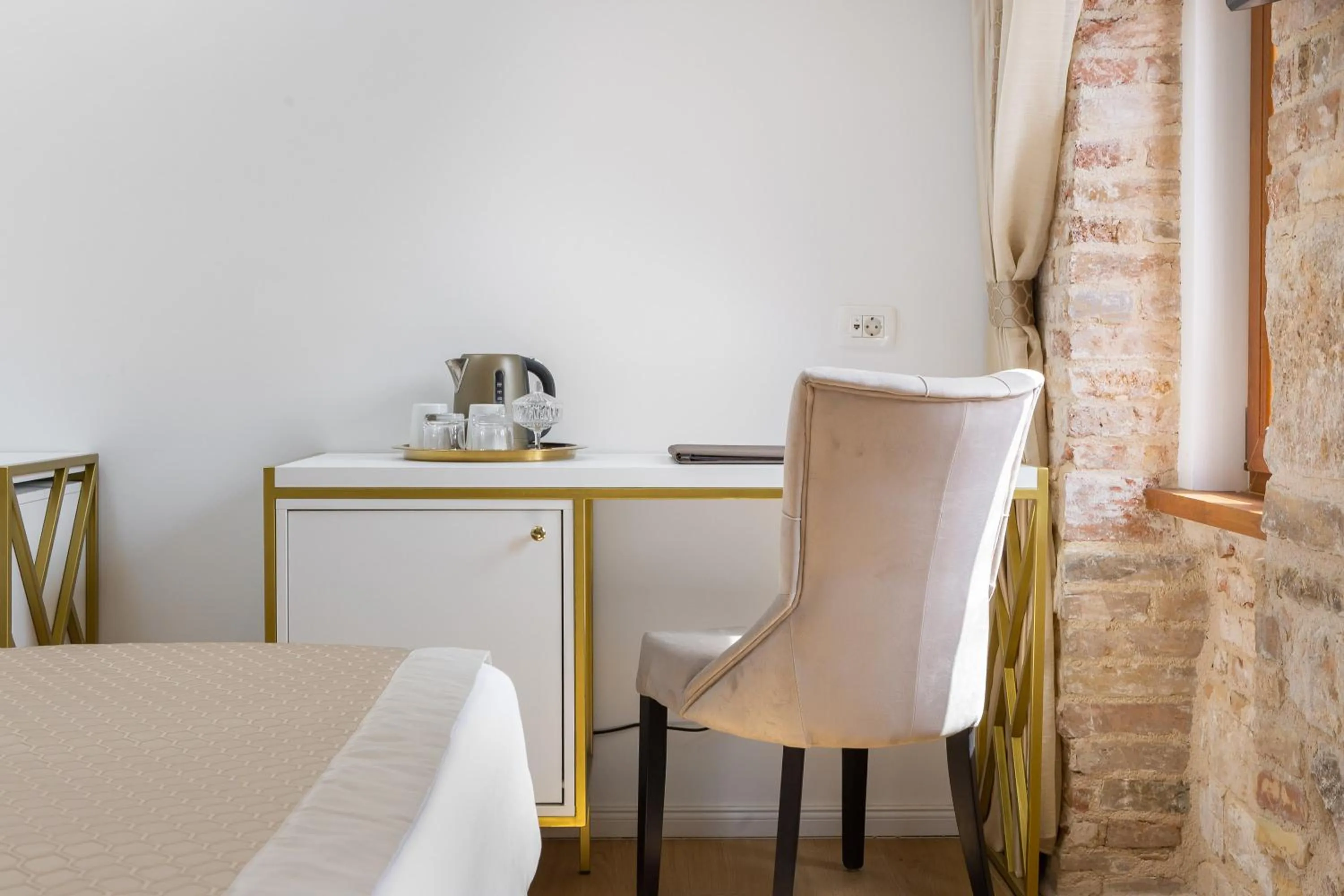 Seating area in Le Premier Luxury Rooms