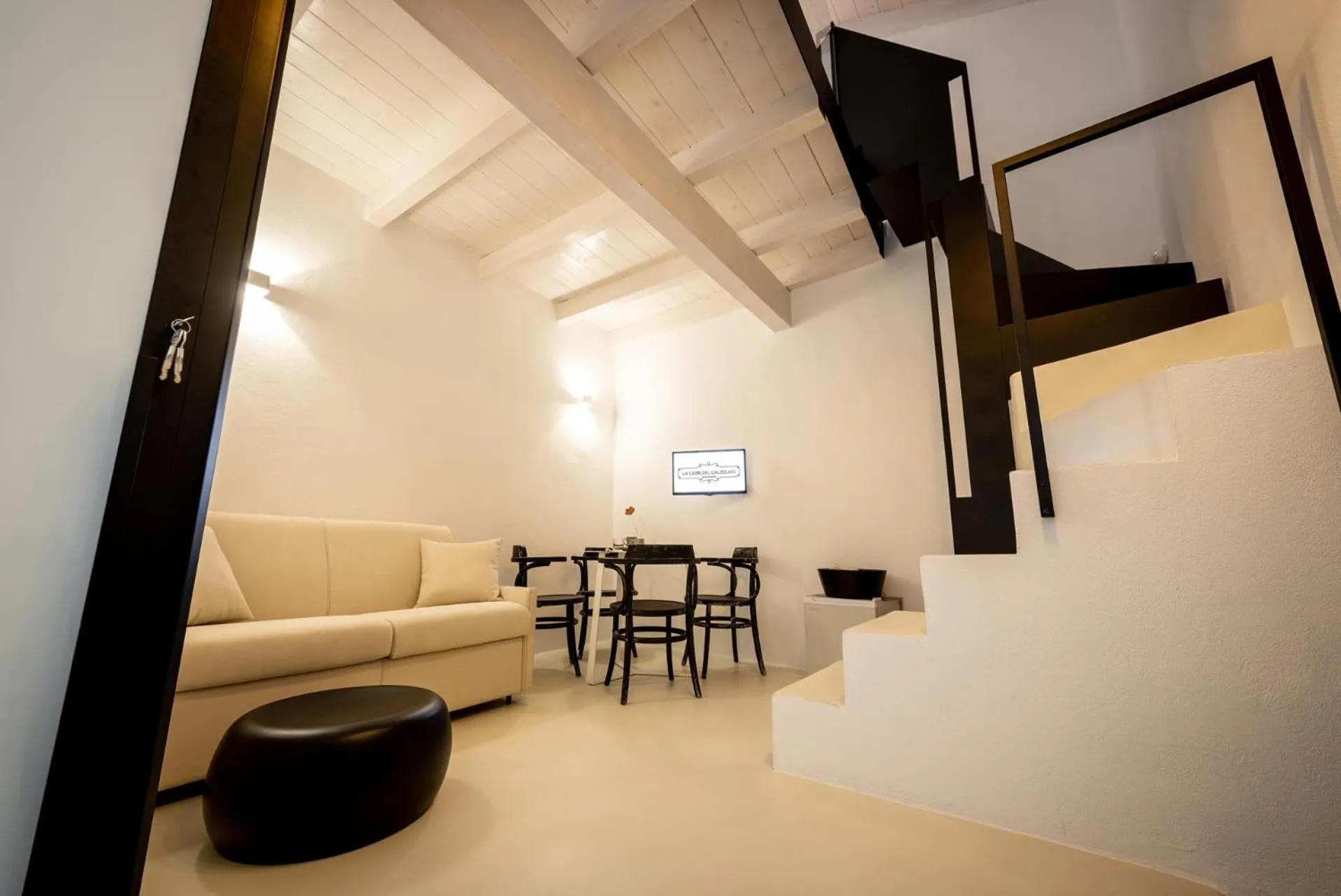 Communal lounge/ TV room, Seating Area in La casa del calzolaio