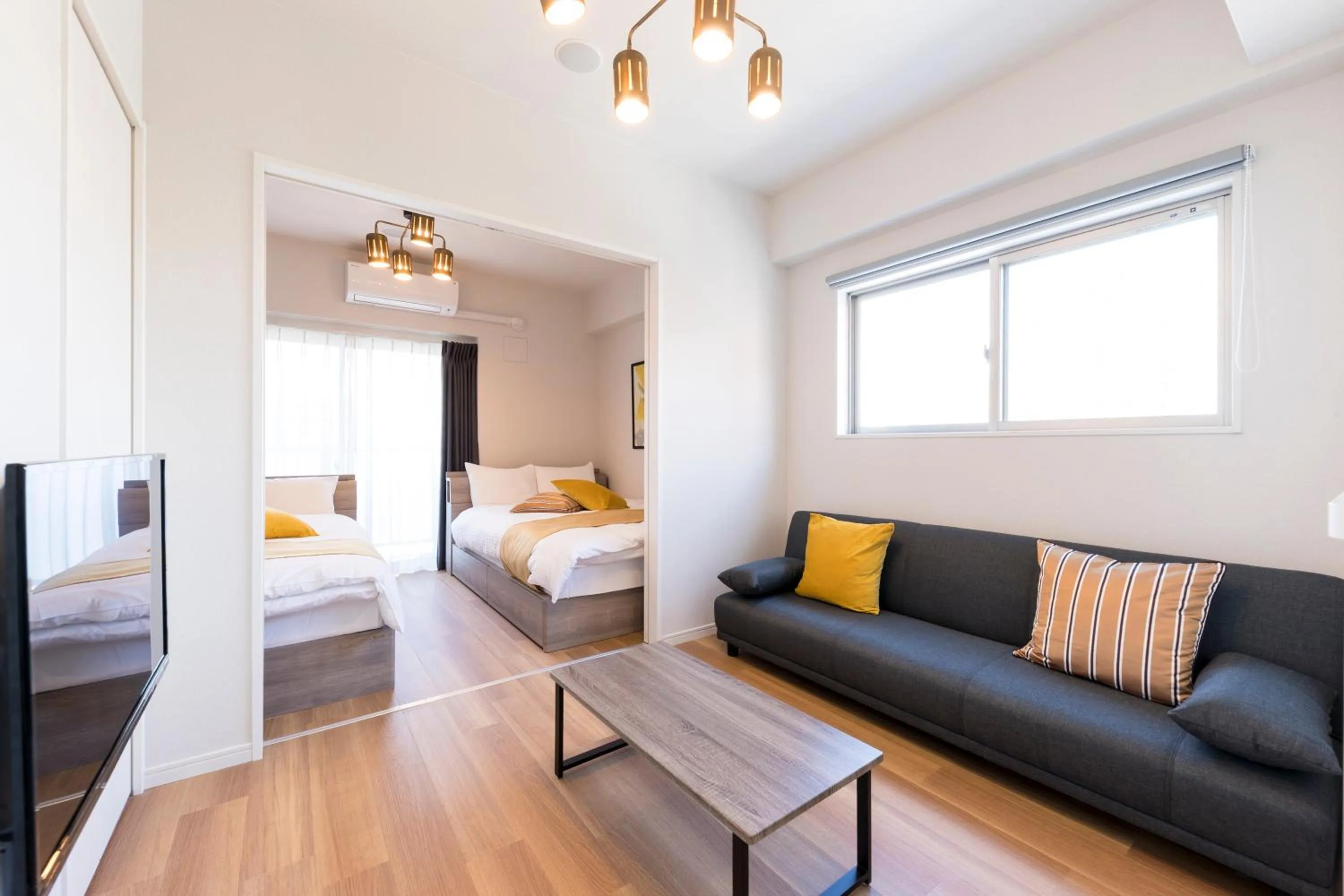 Photo of the whole room, Bed in SG Residence Inn Hakataekiminami