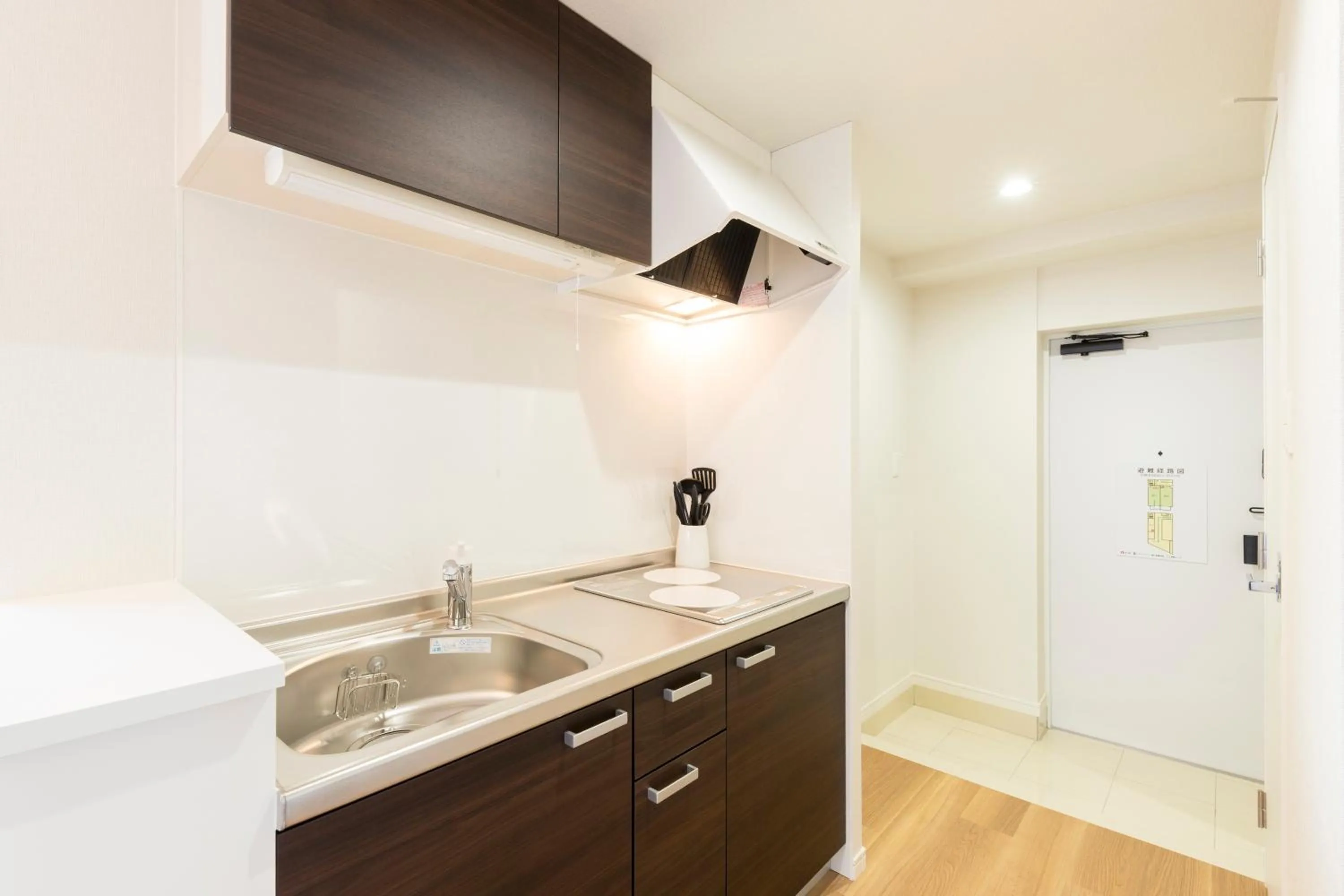 Kitchen or kitchenette in SG Residence Inn Hakataekiminami