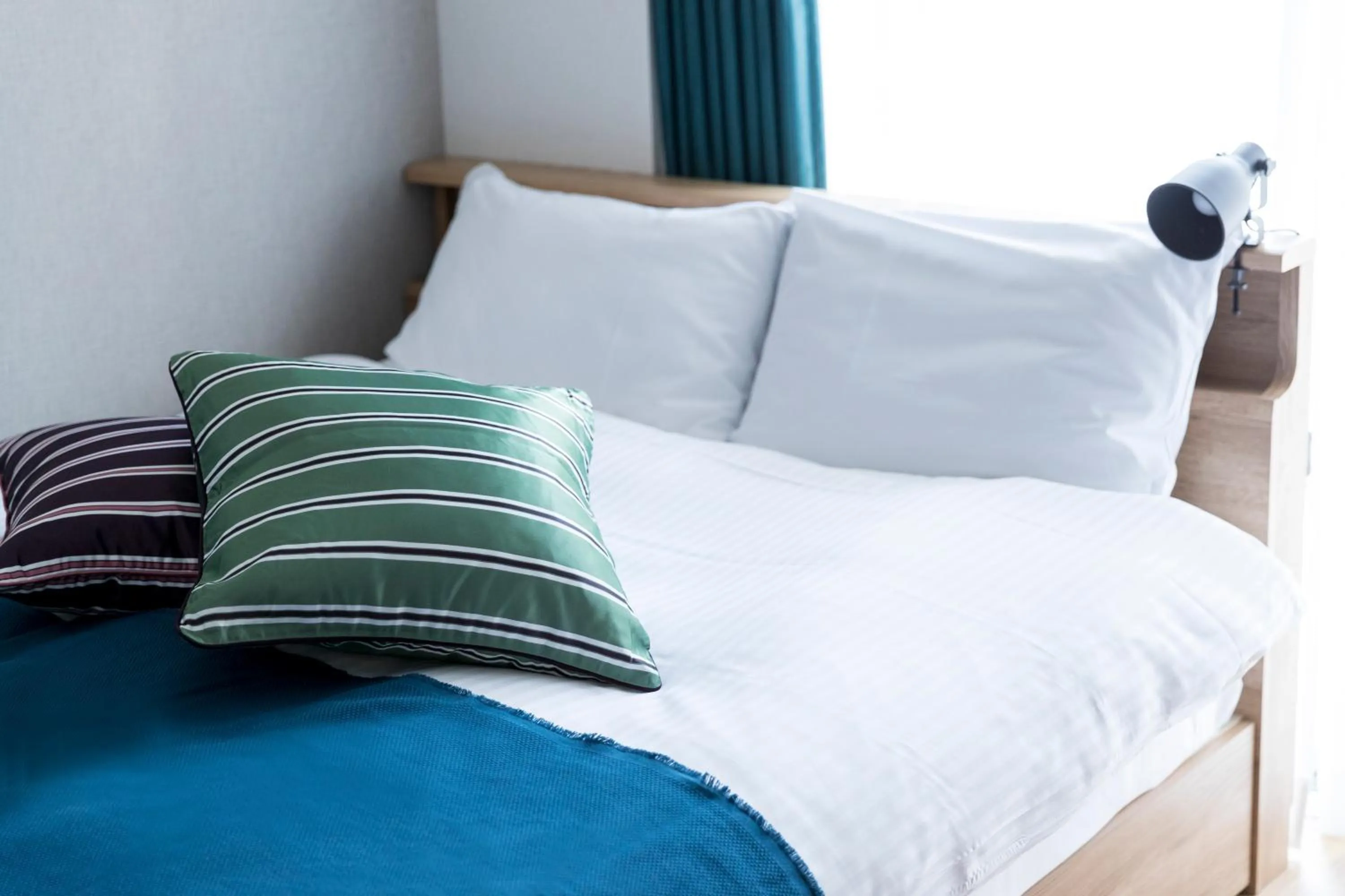 Bed in SG Residence Inn Hakataekiminami