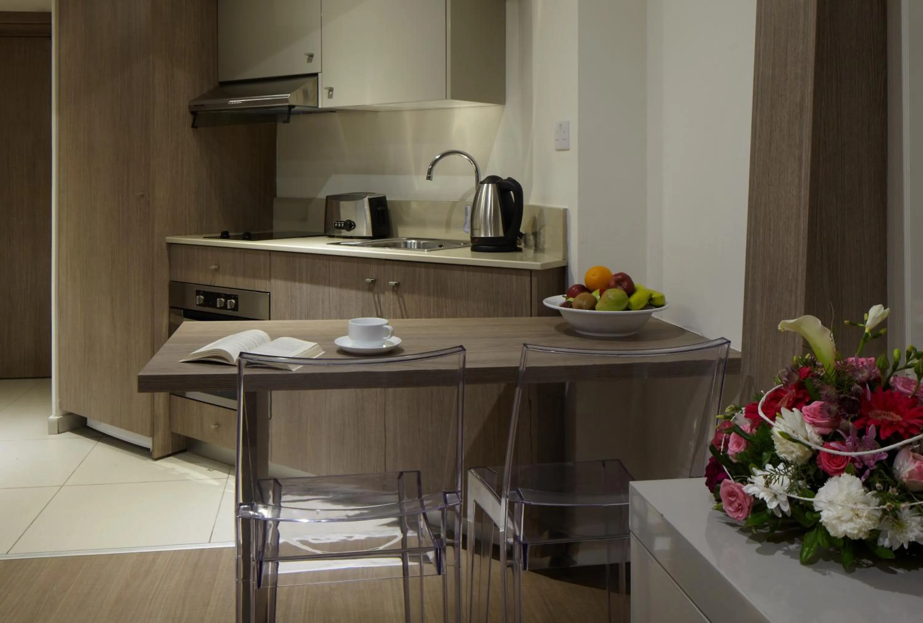 Kitchen or kitchenette in Melpo Antia Hotel & Suites