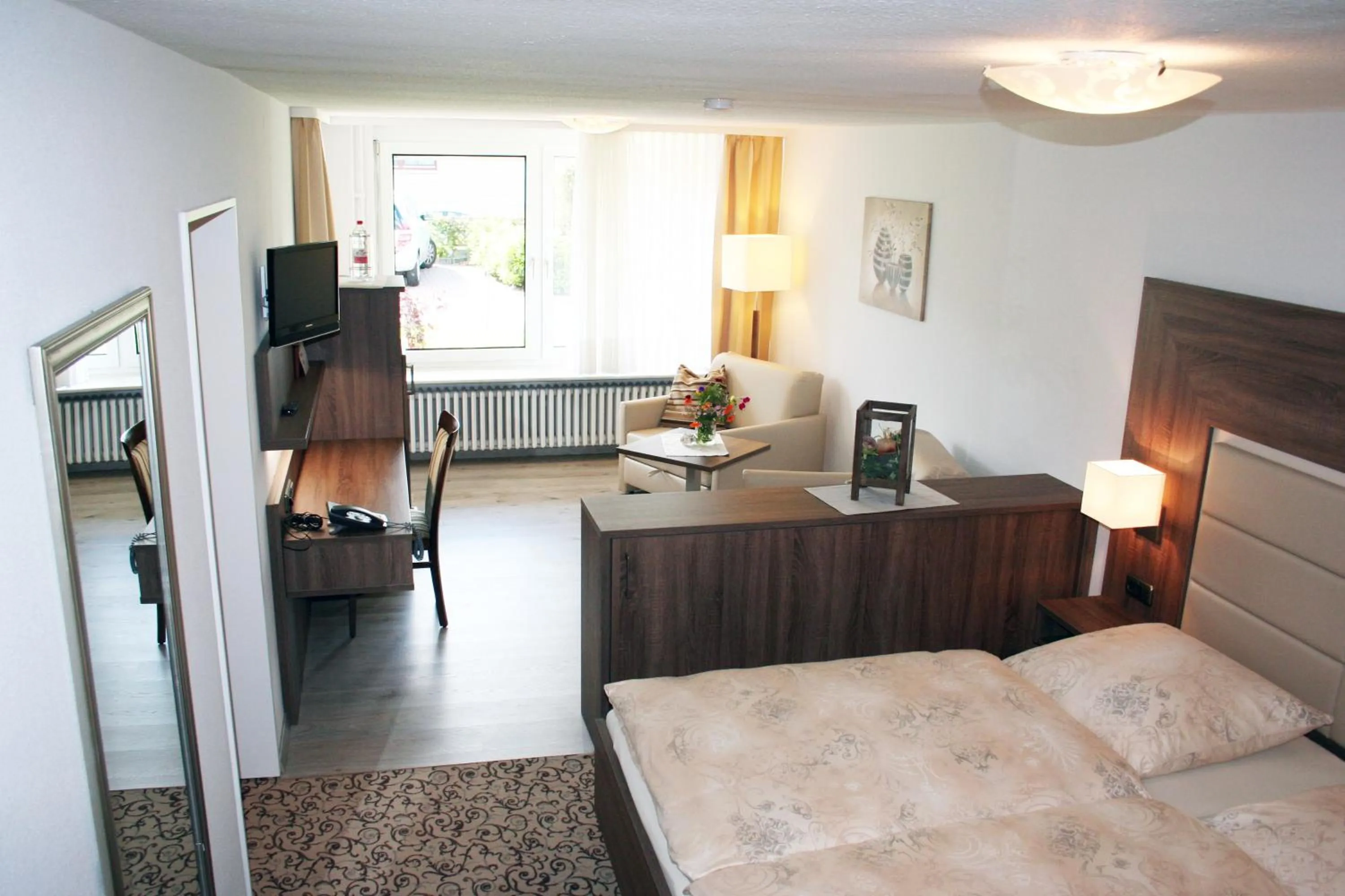 Living room, Bed in Hotel Villa Undine