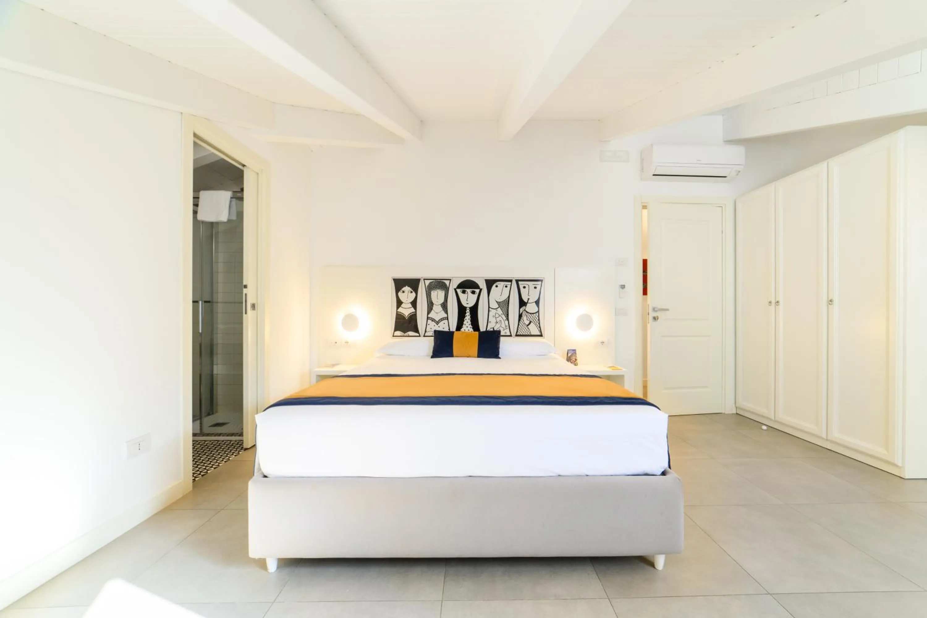 Bed in Zia Pupetta Suites