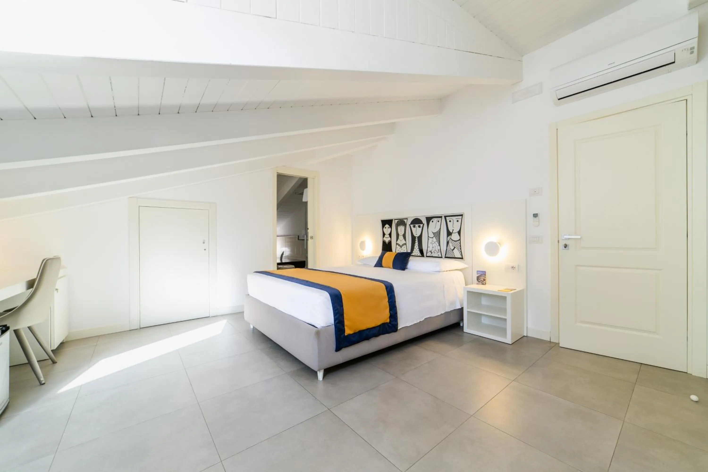 Bed in Zia Pupetta Suites