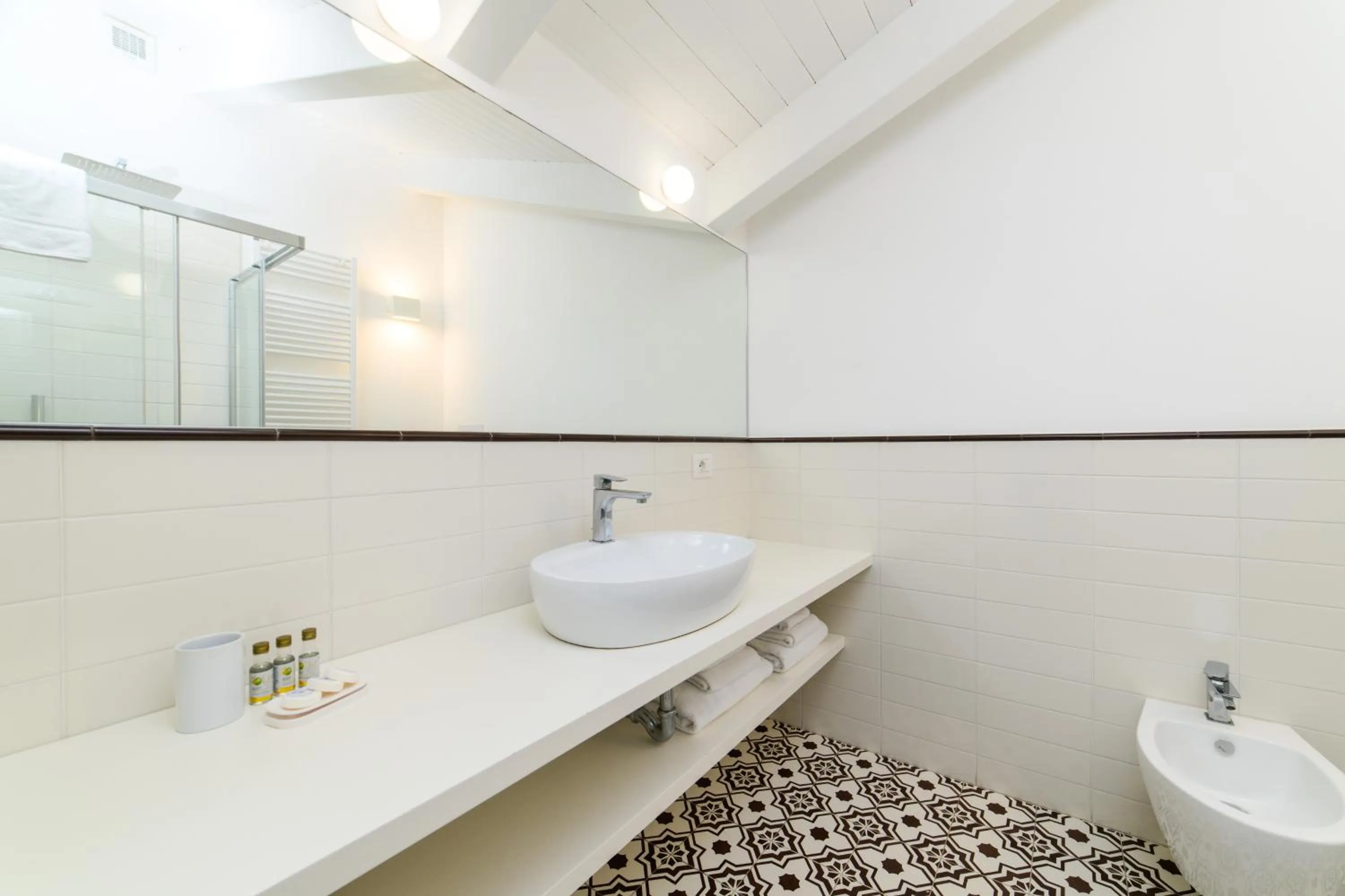 Toilet in Zia Pupetta Suites