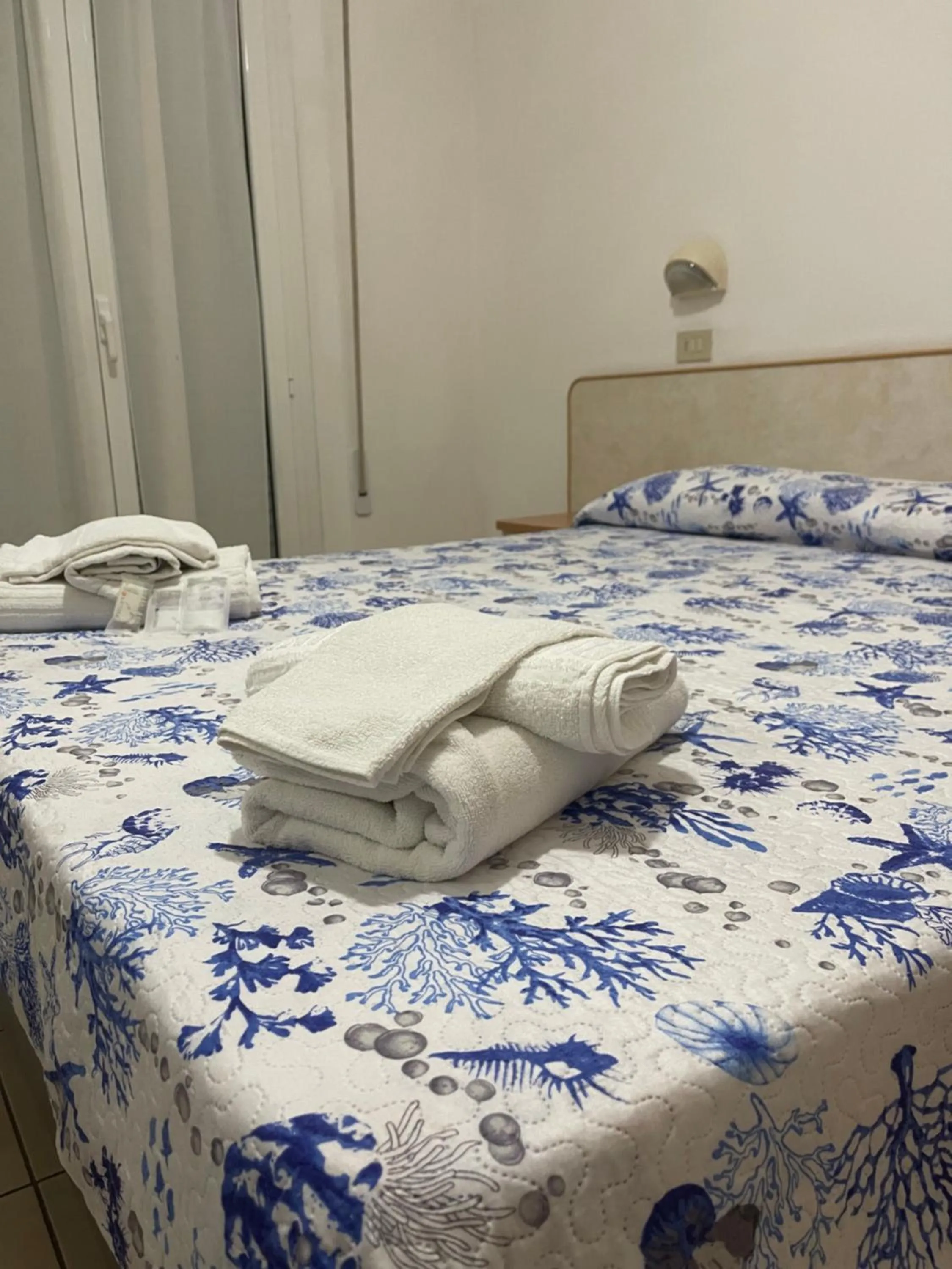 Bed in Hotel Vienna Rivazzurra