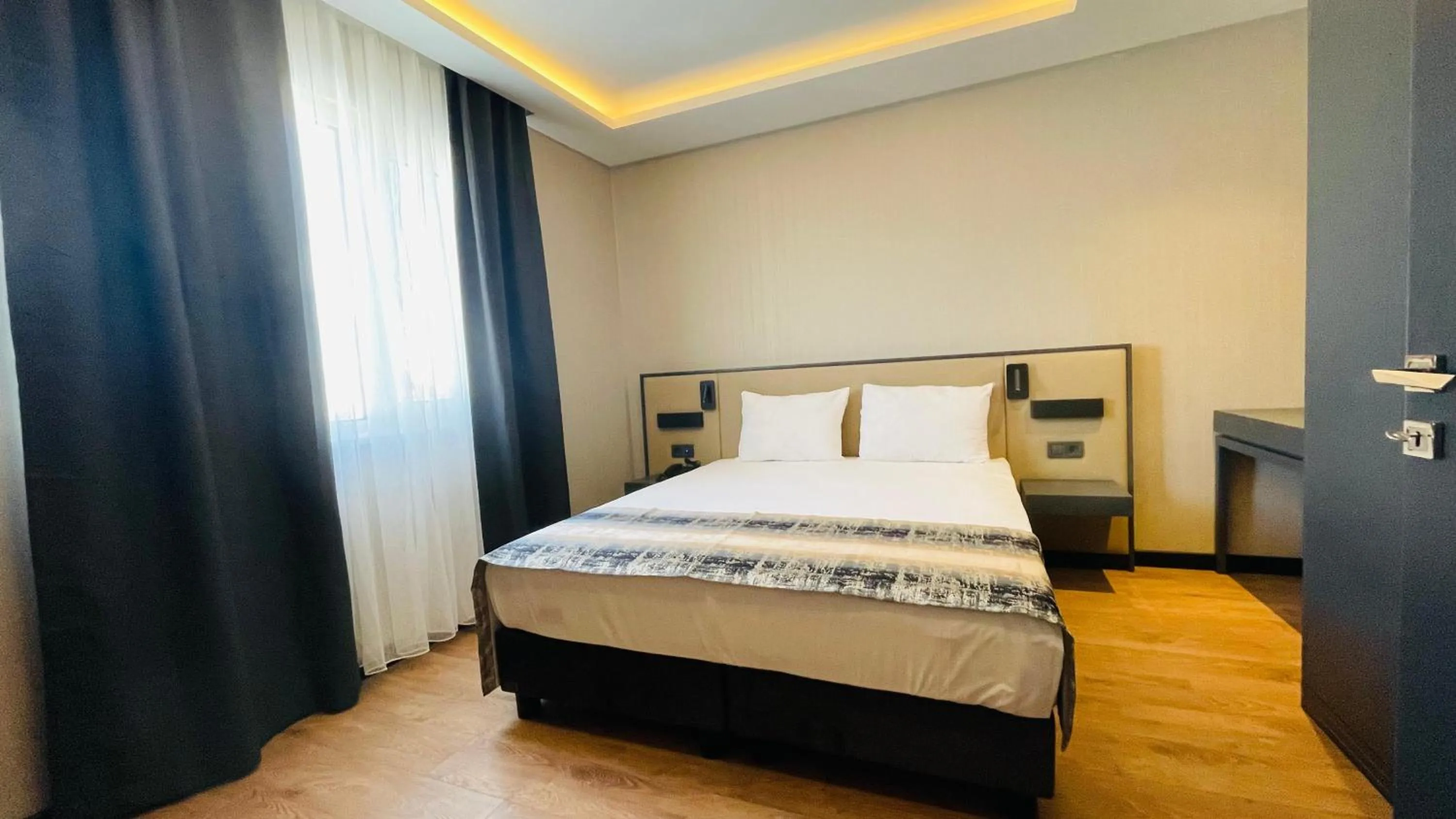 Bed in Osmanbey Fatih Hotel