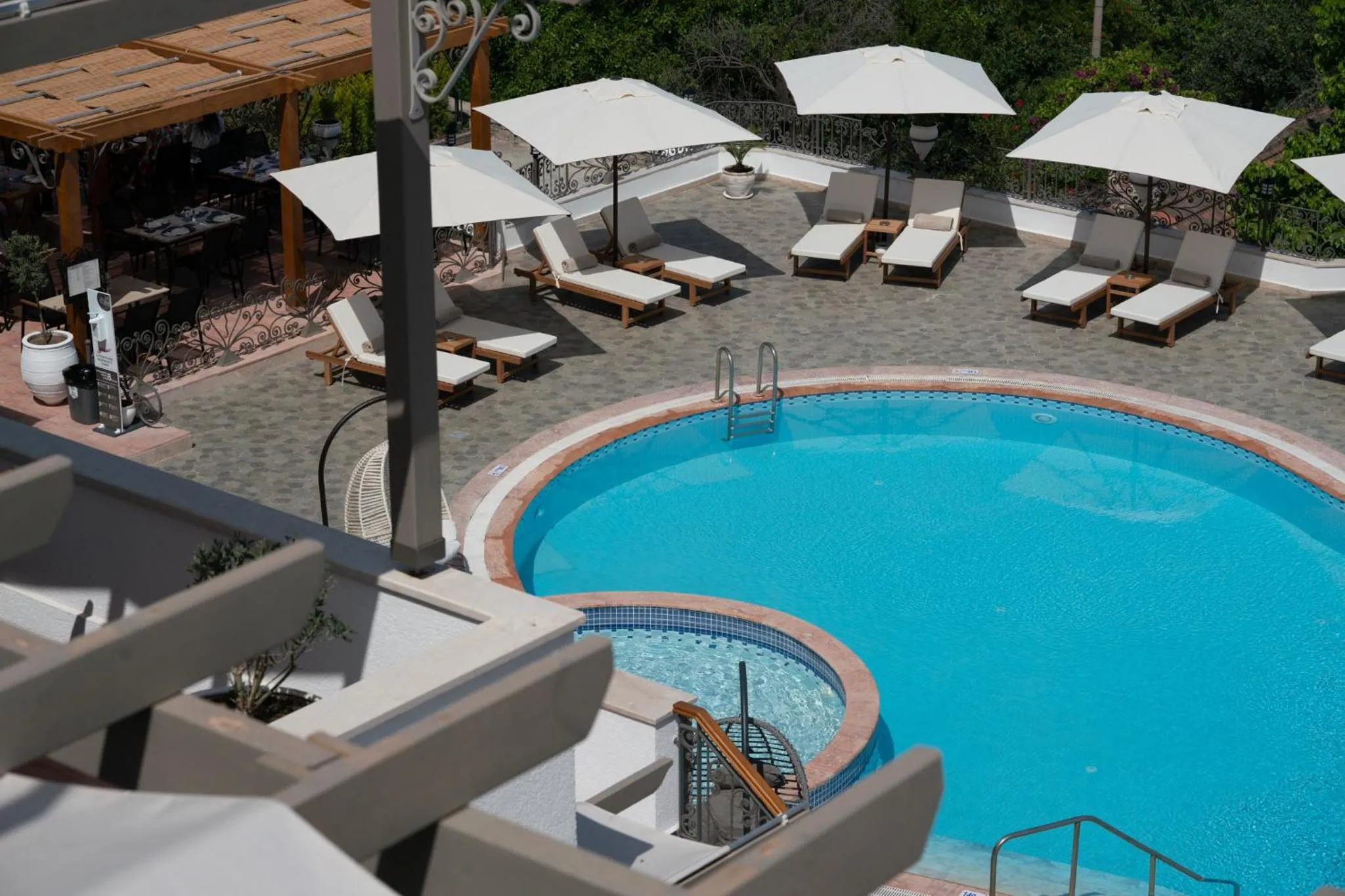 Swimming pool in Elementa Boutique Hotel - Adults Only