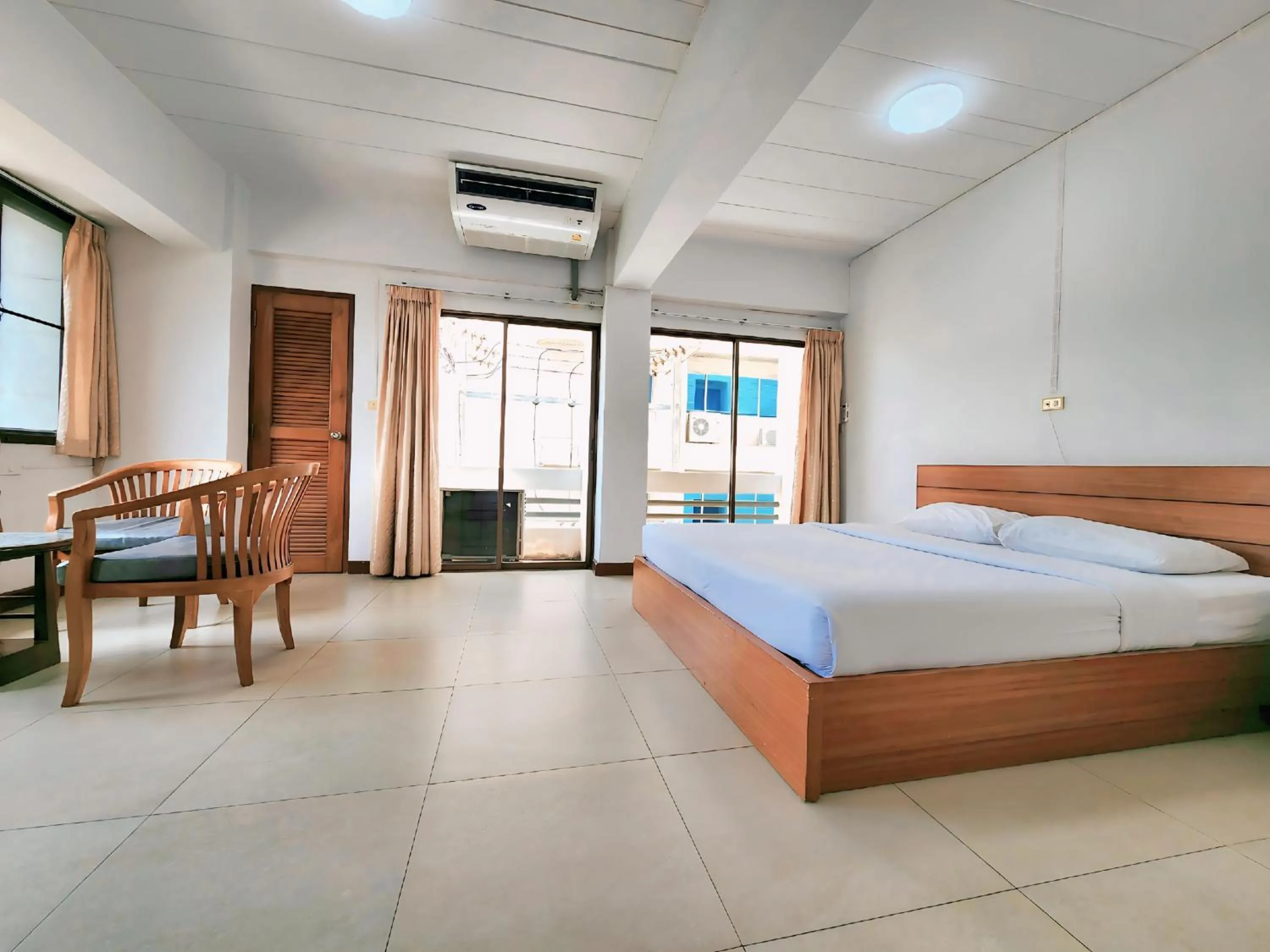 Bed in Siam Palace Hotel