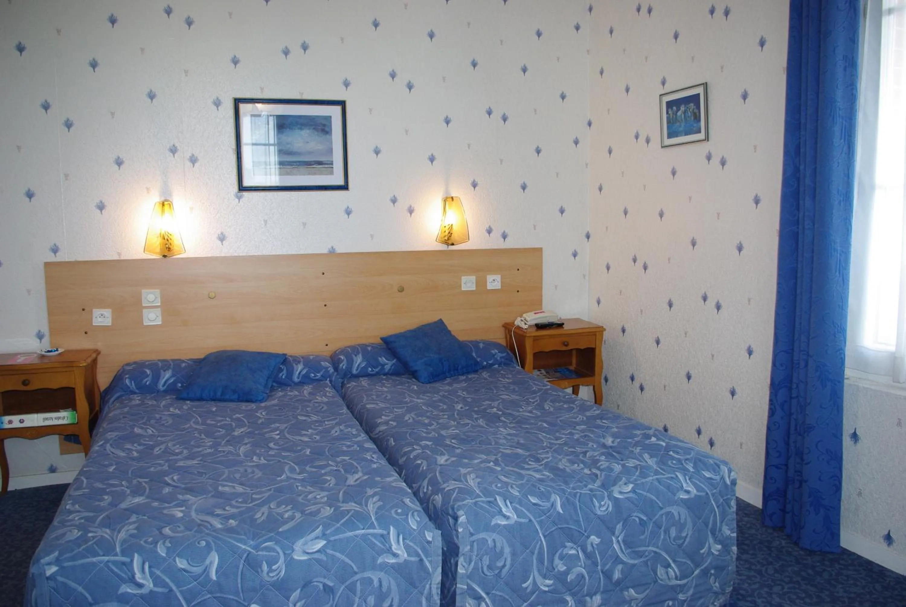 Bedroom in Hotel Du Parc