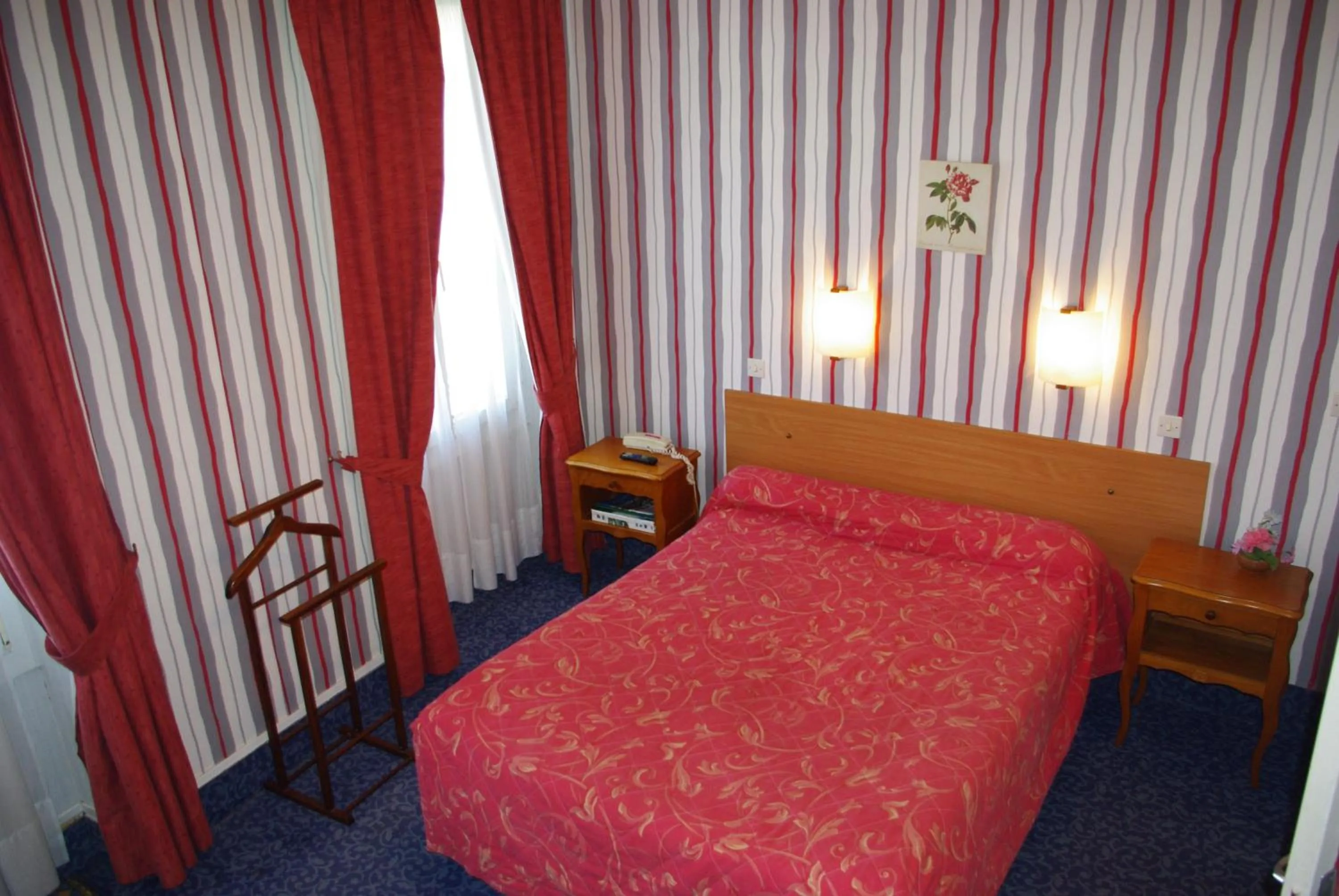 Bedroom in Hotel Du Parc