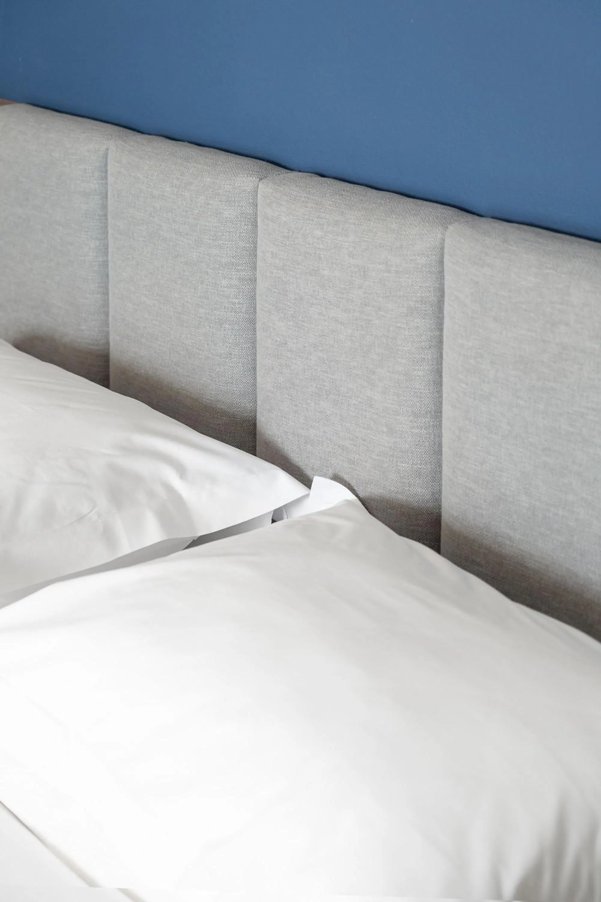 Bed in Captain's Seafront Apartments